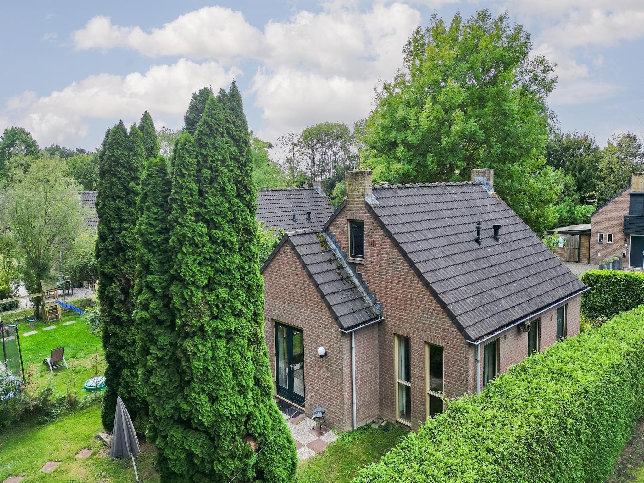 De buitenkant van 7 - Persoons Forest 217 Sauna Bungalow (copy) (copy) in Ewijk