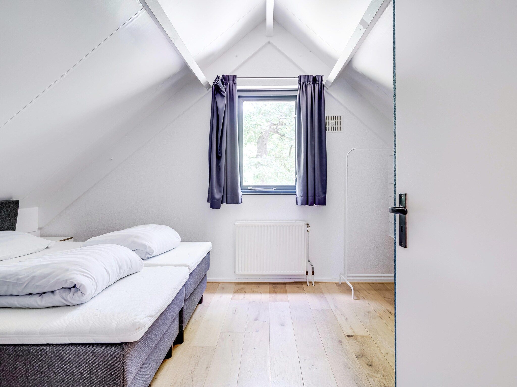 Een slaapkamer van 6 - Persons De Zingende Wilg (copy) (copy) (copy) in Ewijk