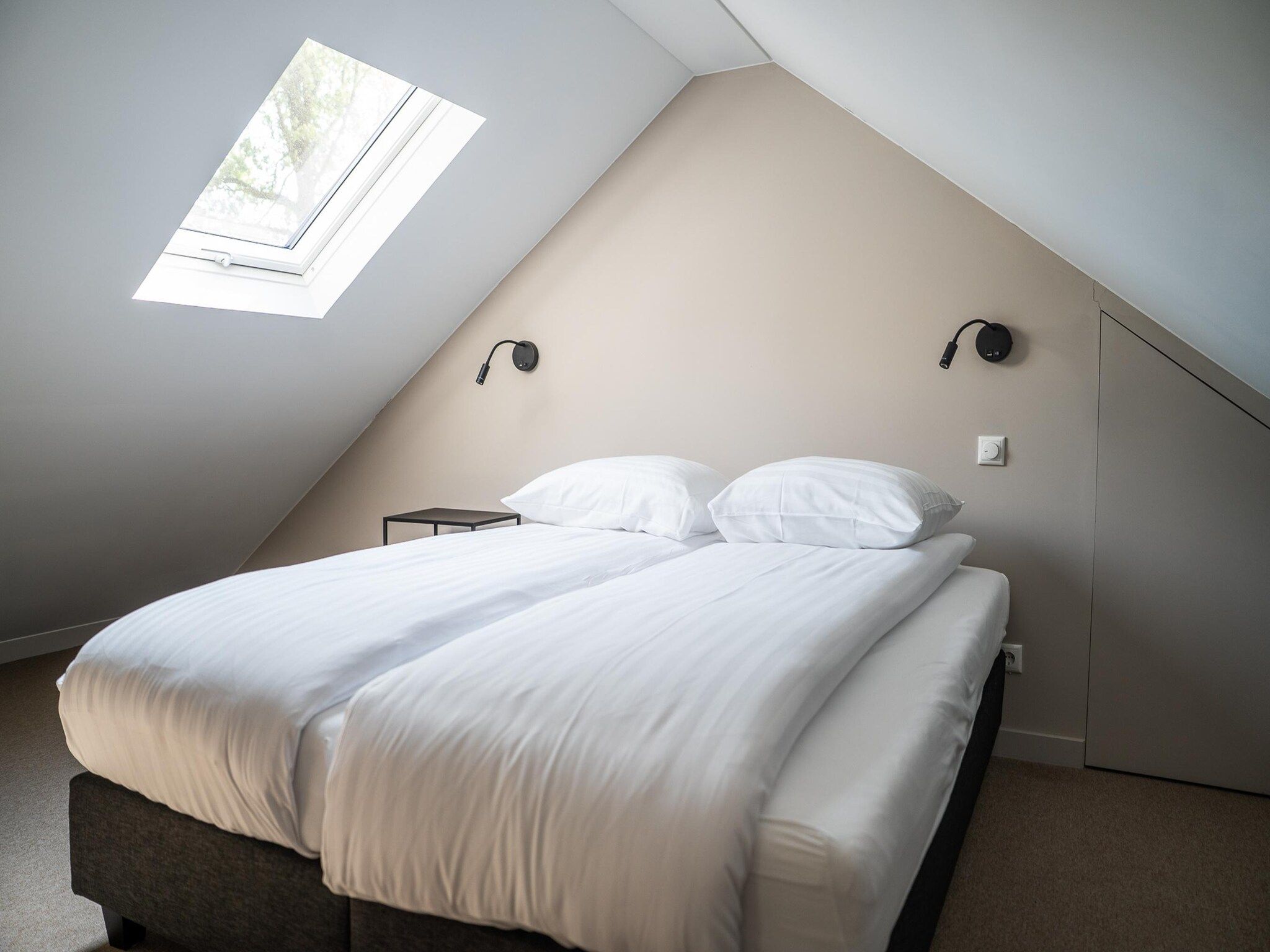 Een slaapkamer van Ecovilla Waterzicht  6 people Luxe in Oirschot
