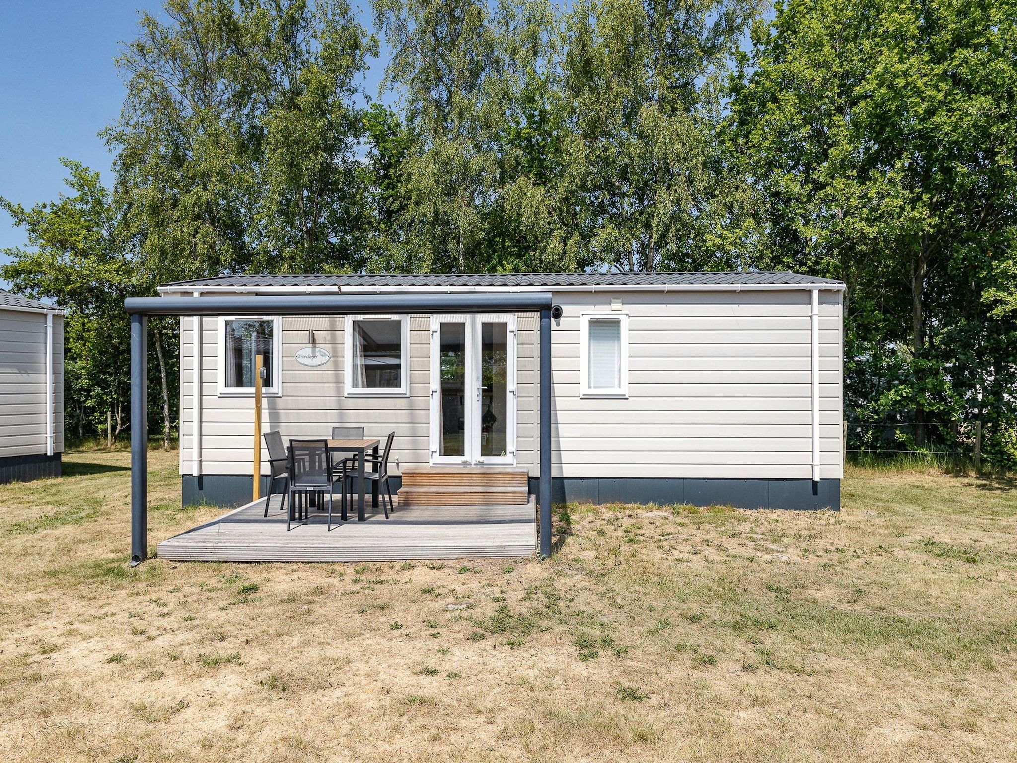 De buitenkant van Duinhoeve Chalet Vogel - Huisdier niet toegestaan in Burgh-Haamstede