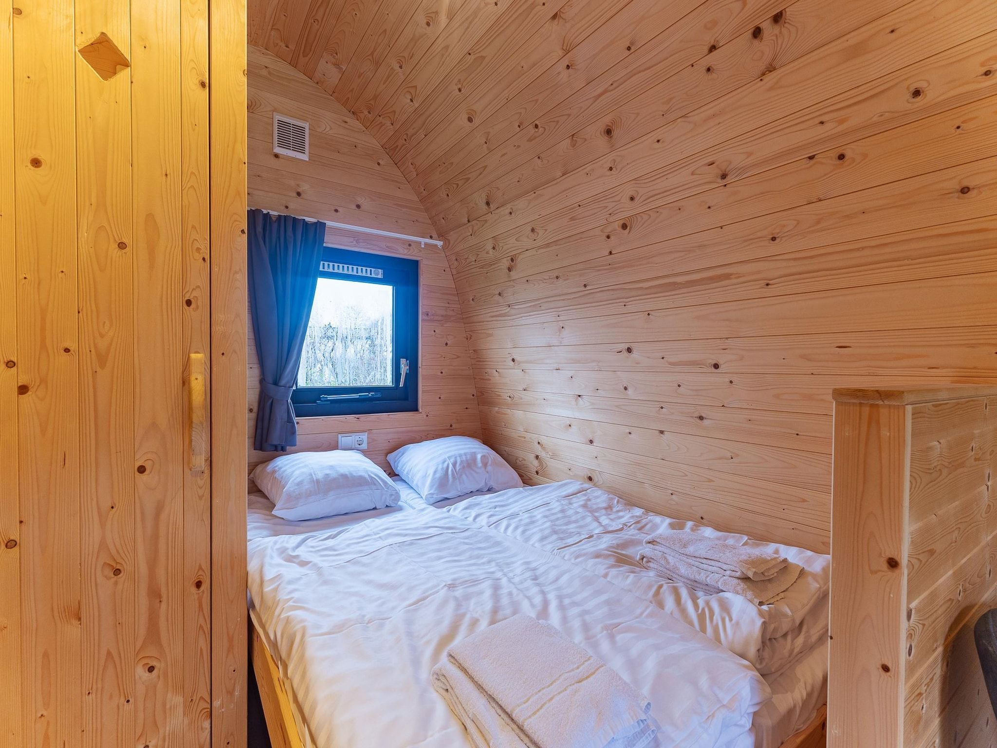 Een slaapkamer van Duinhoeve Duinlodges 2 pers (huisdiervriendelijk) in Burgh-Haamstede