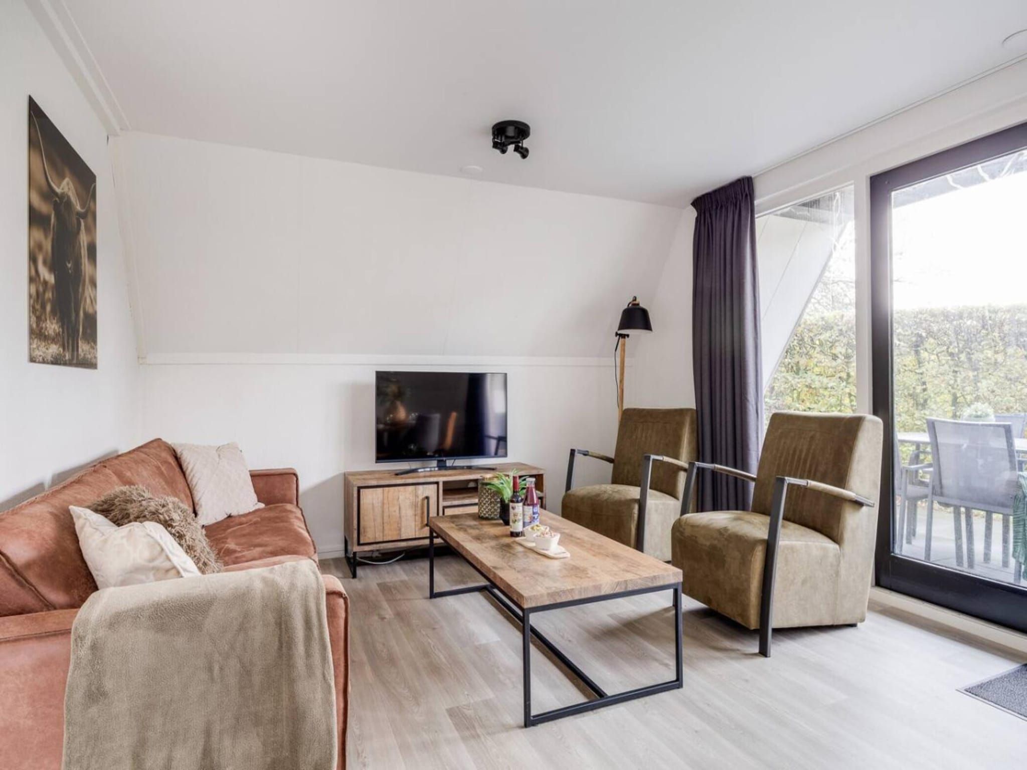 De woonkamer van 118 | Rietzanger | Sfeervol ingerichte bungalow in Den Haag