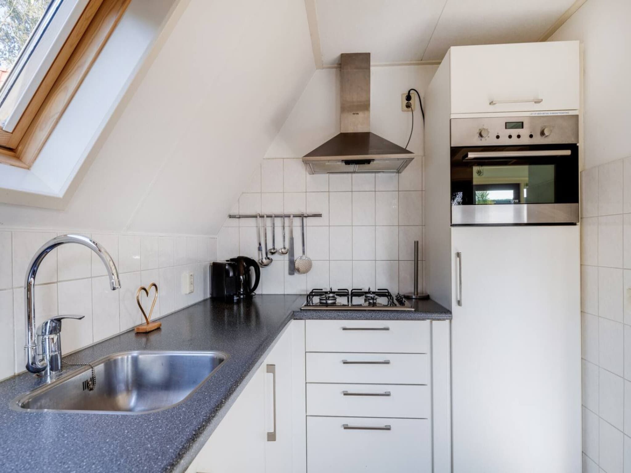 Een slaapkamer van 92 | Gaai | Prachtige bungalow nabij natuur in Den Haag