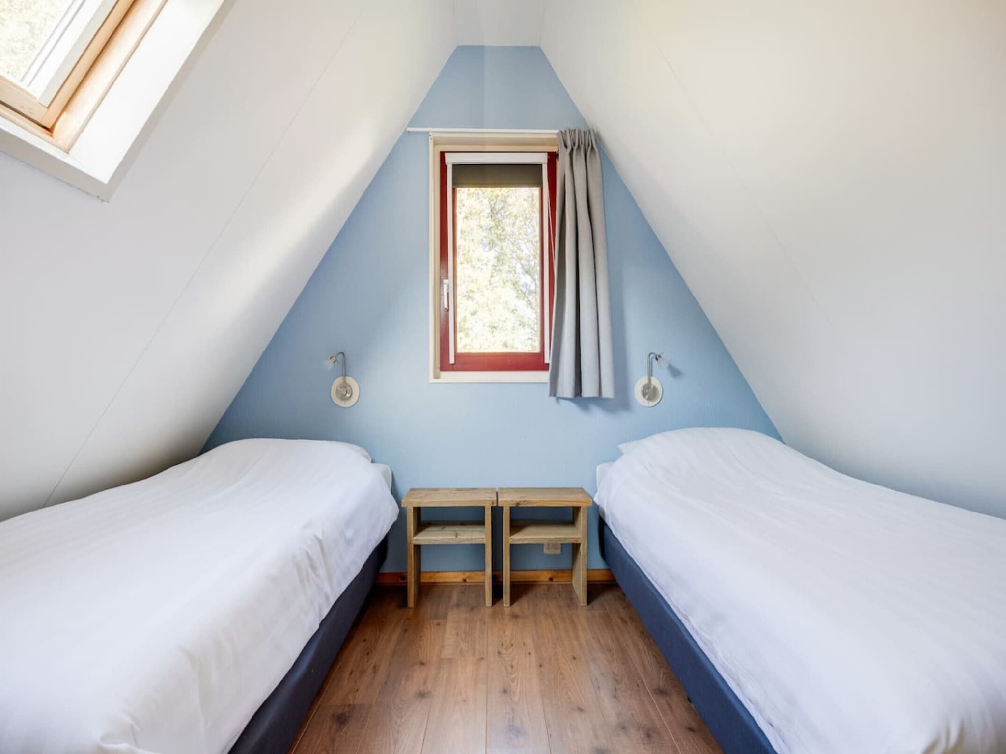 Een slaapkamer van 92 | Gaai | Prachtige bungalow nabij natuur in Den Haag
