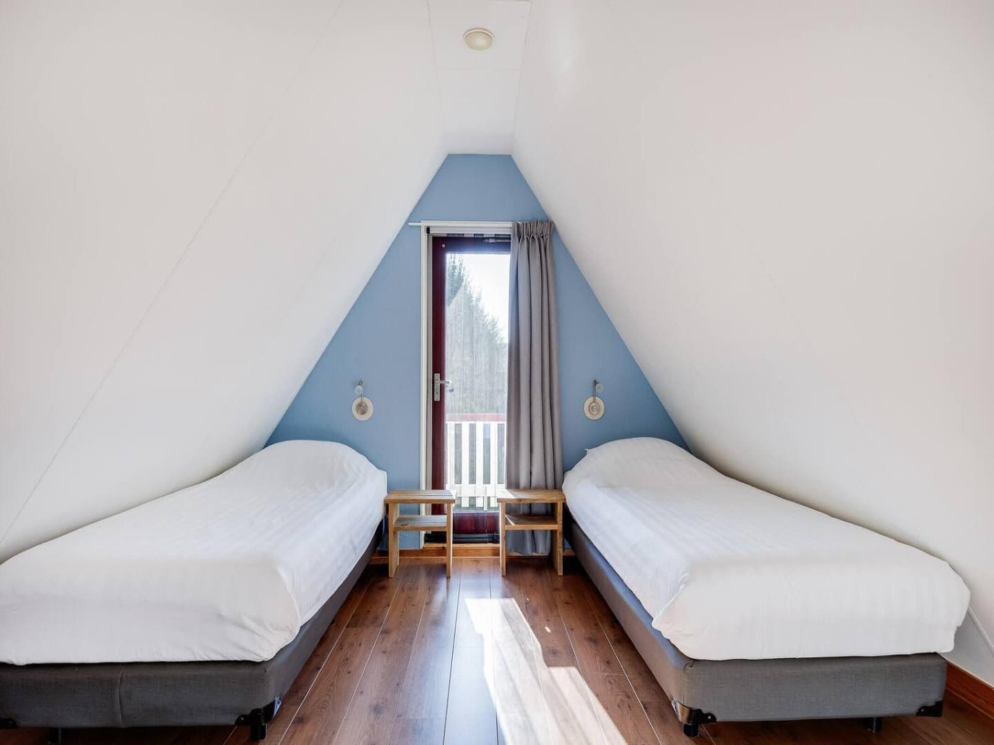 Een slaapkamer van 92 | Gaai | Prachtige bungalow nabij natuur in Den Haag