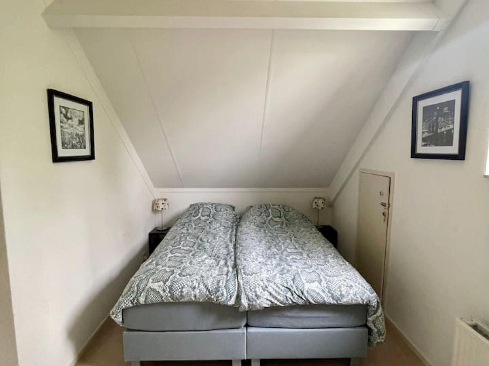 Een slaapkamer van 6 - Persons Forest Bungalow (copy) in Ewijk