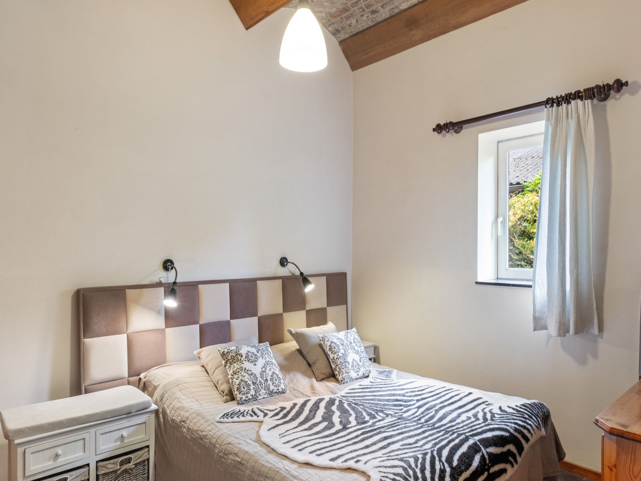 Een slaapkamer van Meschermolen 8 in Mesch-Eijsden