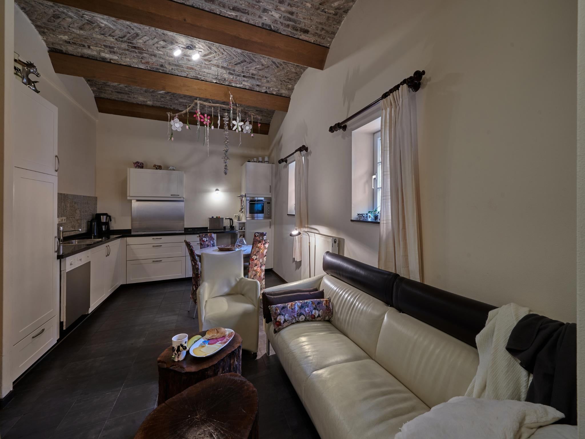 De woonkamer van Meschermolen 8 in Mesch-Eijsden