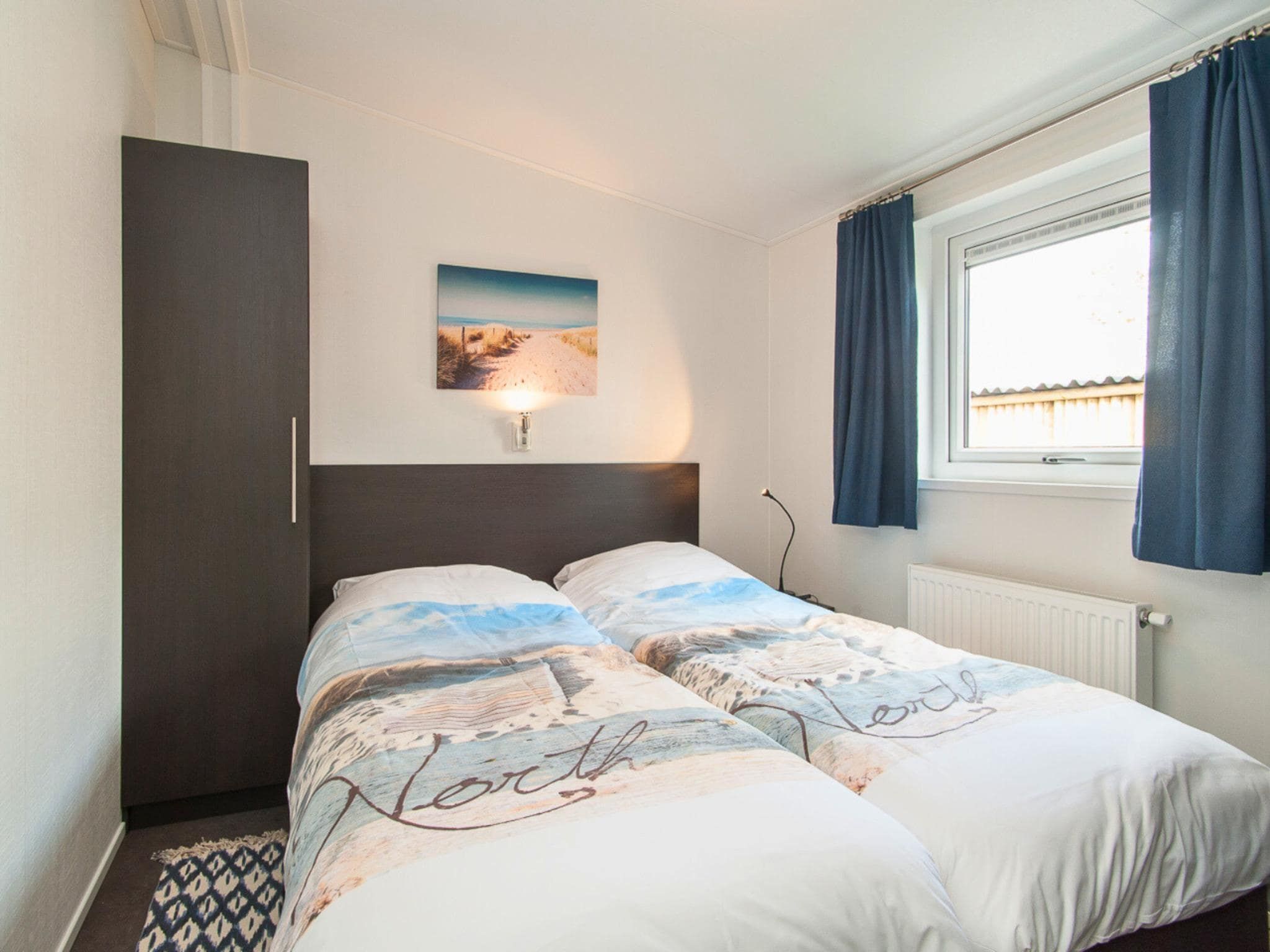 Een slaapkamer van Chalet 4-persoons Huisdiervrij in Noordwijk
