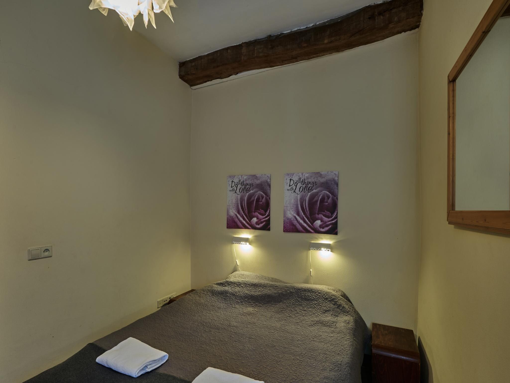 Een slaapkamer van Meschermolen 13 in Mesch-Eijsden