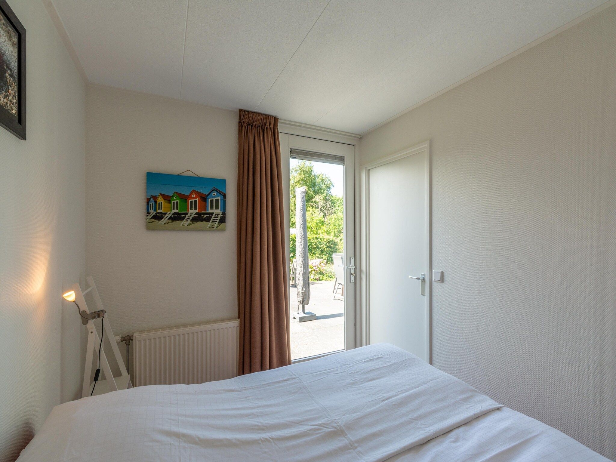 Een slaapkamer van Eureka 27 in Sint Maartenszee