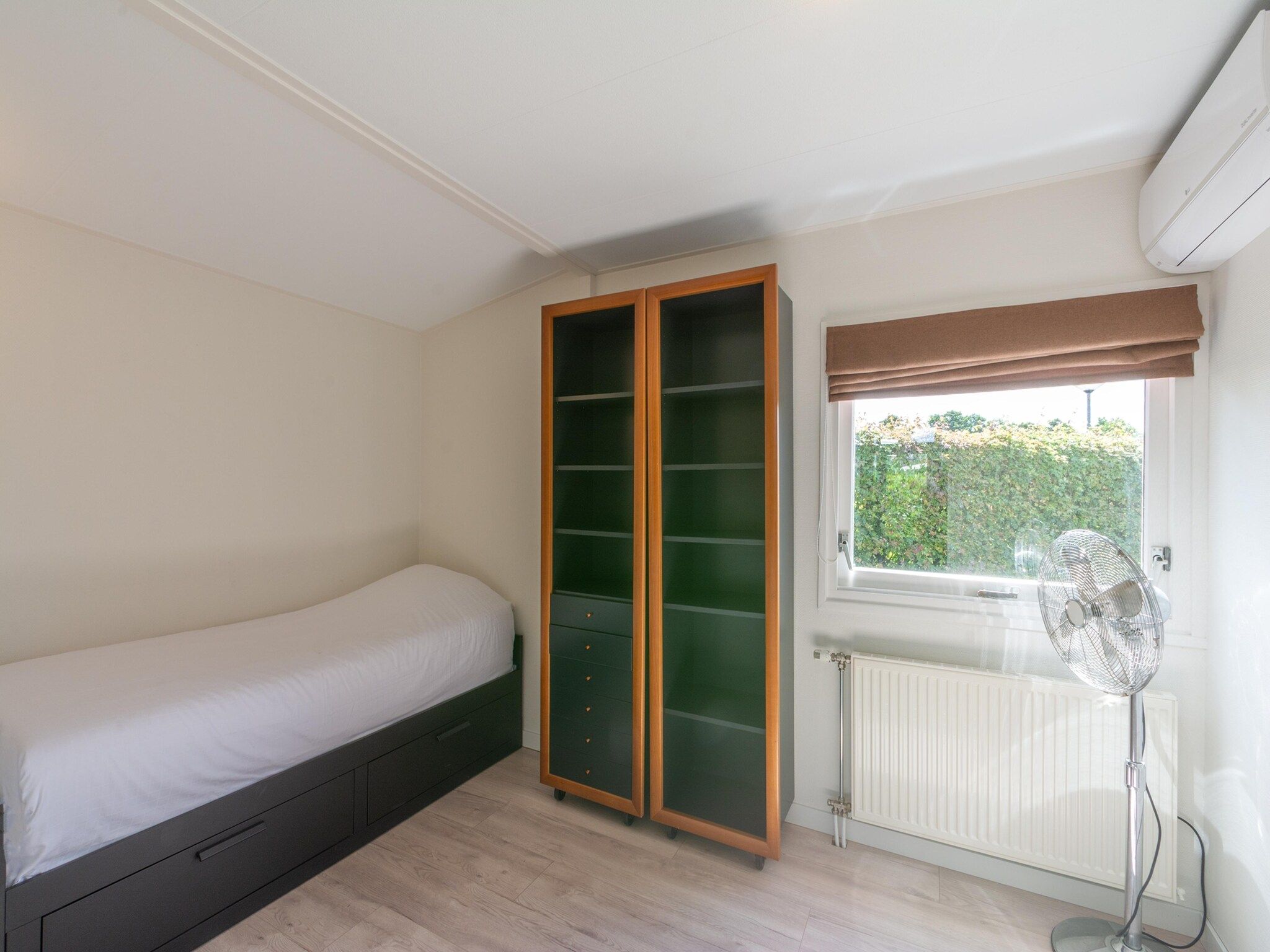 Een slaapkamer van Eureka 27 in Sint Maartenszee