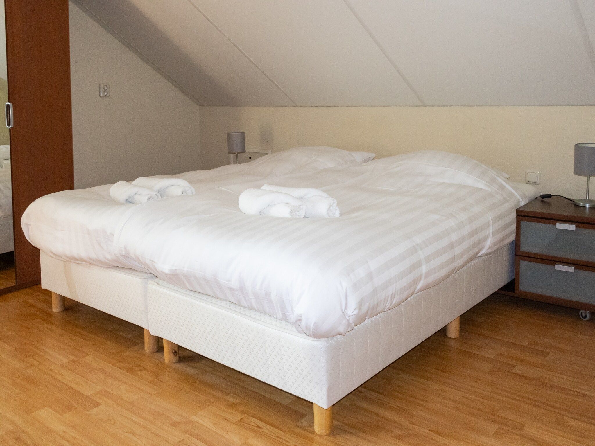 Een slaapkamer van Huis in de Bossen in Een