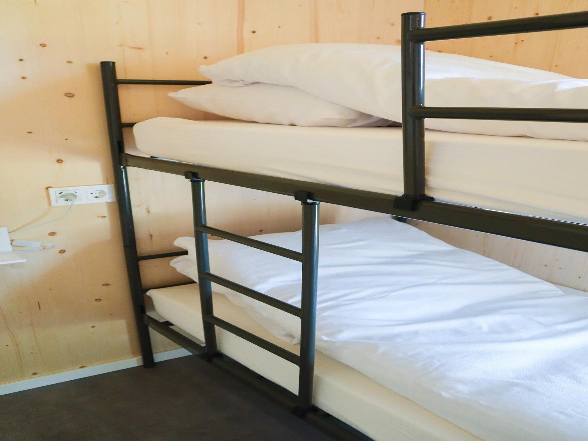 Een slaapkamer van Bungalow Ocean Deluxe 8 Person in ’s-Gravenzande