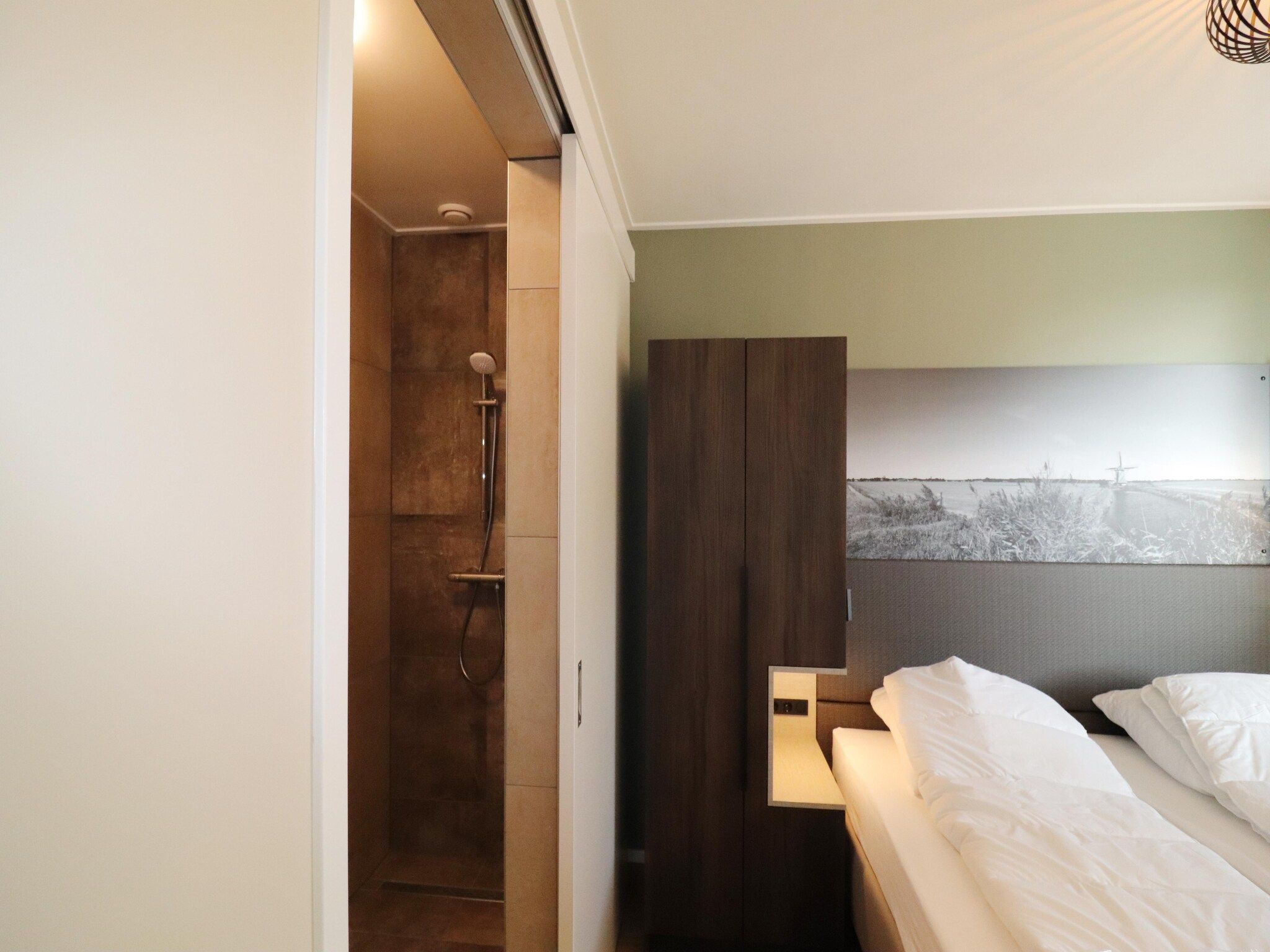 Een slaapkamer van Moderne villa op het Friese platteland in leons