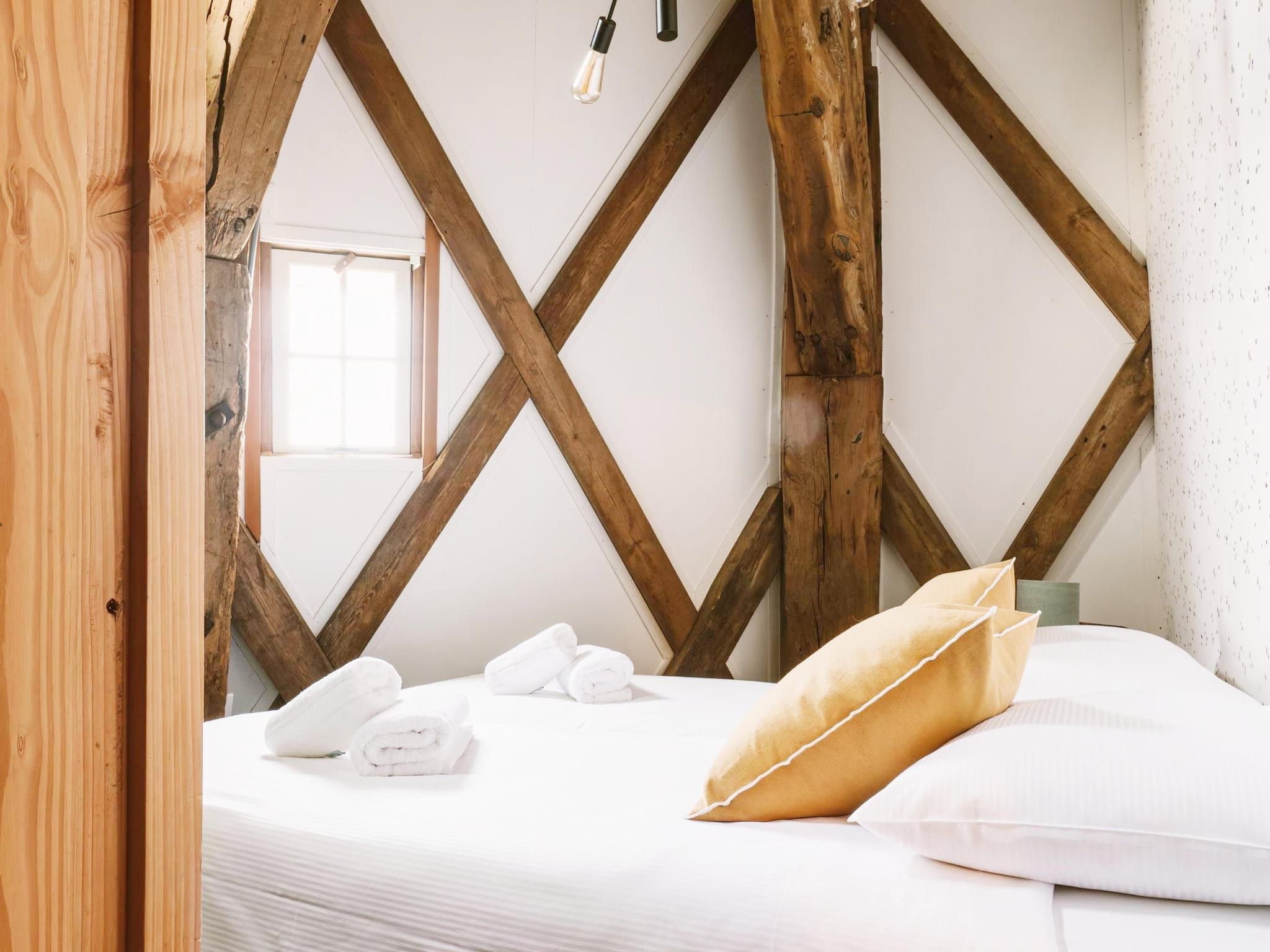 Een slaapkamer van De Molen van Egmond in Egmond aan den Hoef