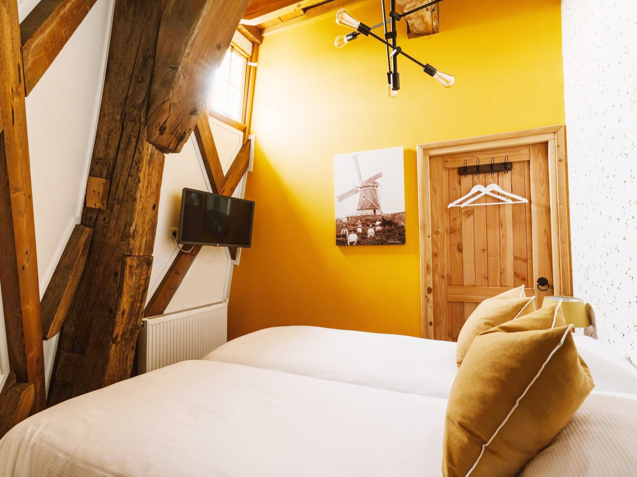 Een slaapkamer van De Molen van Egmond in Egmond aan den Hoef