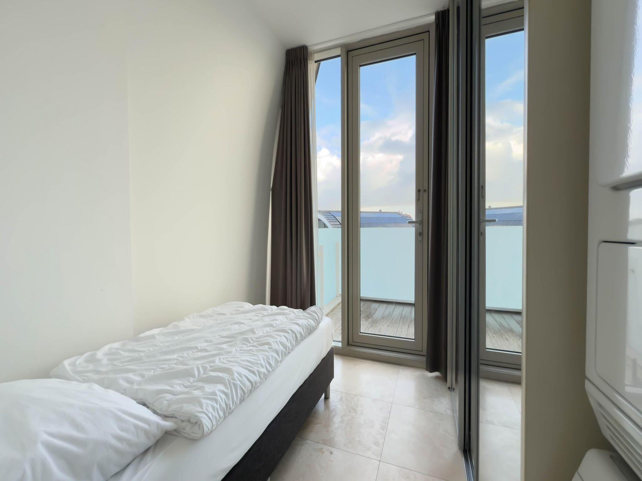 Een slaapkamer van Droomlicht in Egmond aan Zee