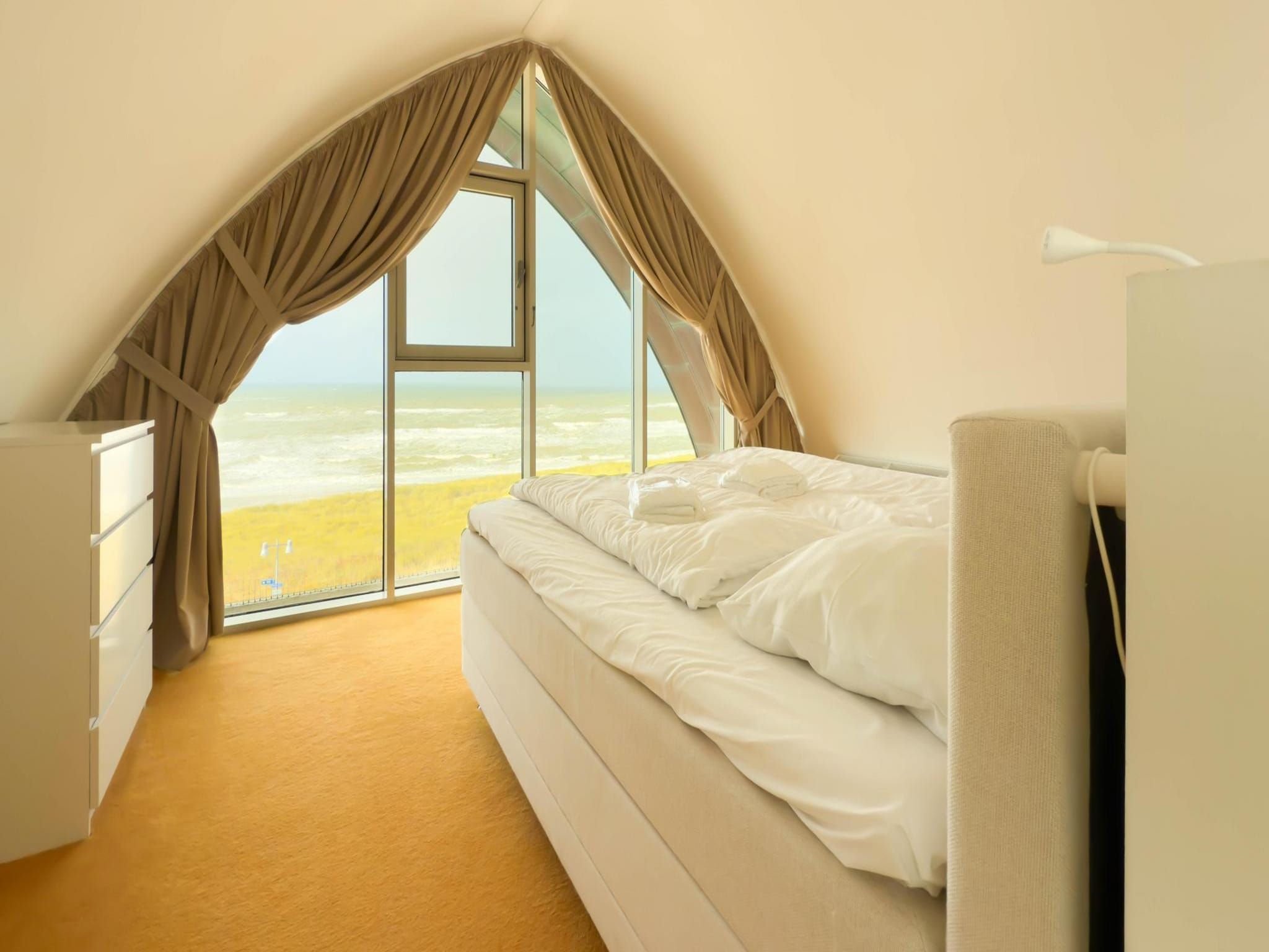 Een slaapkamer van Droomlicht in Egmond aan Zee