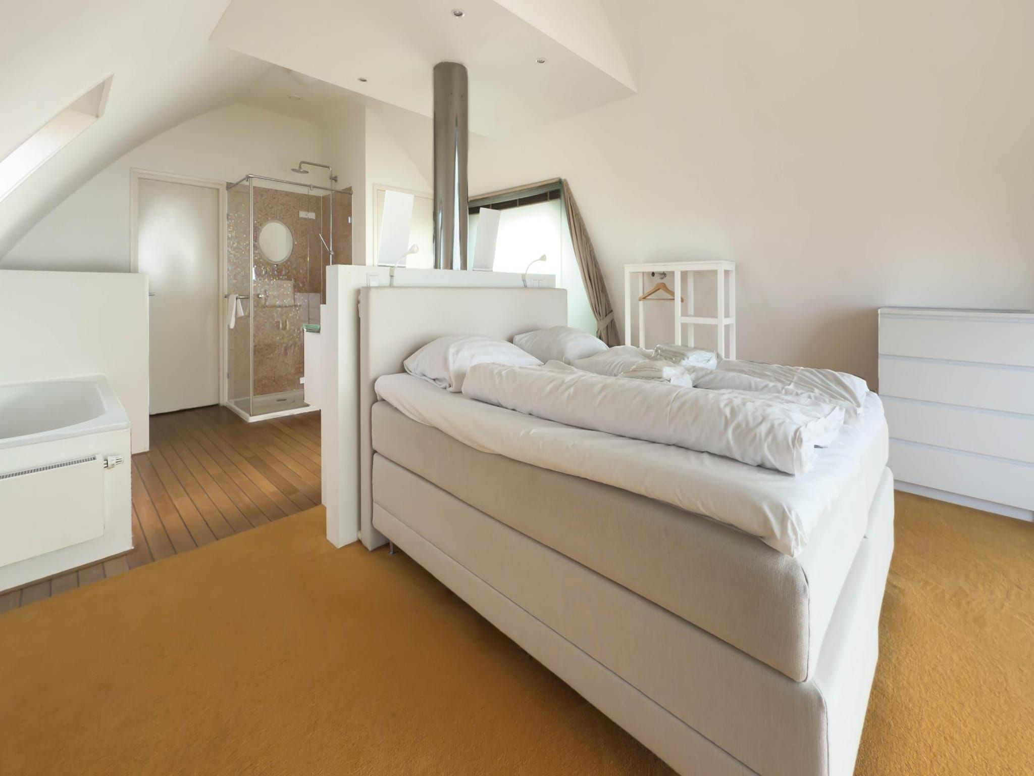 Een slaapkamer van Droomlicht in Egmond aan Zee