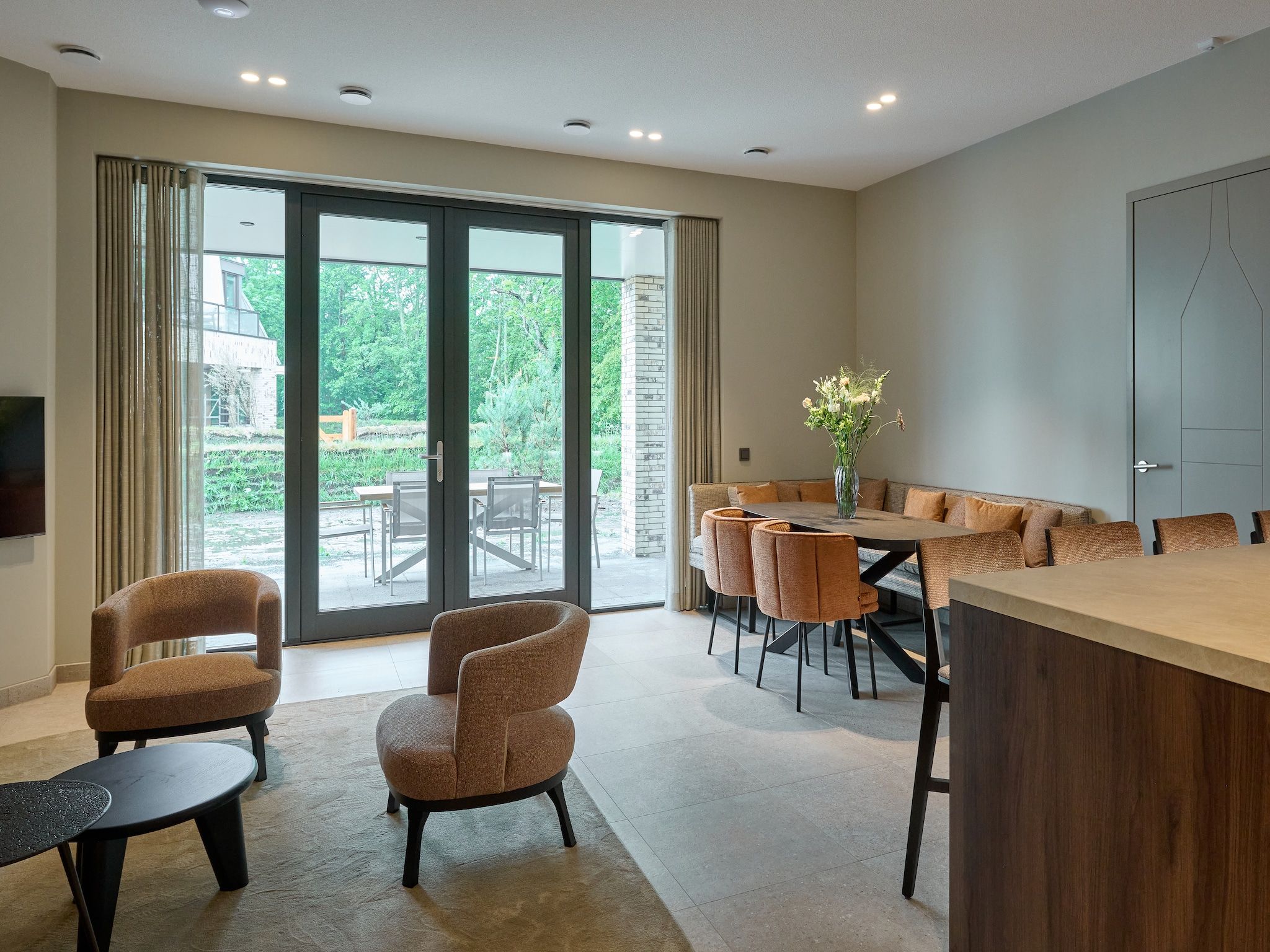 De woonkamer van Droomsuites Texel - 4 persoons appartement in Den Burg