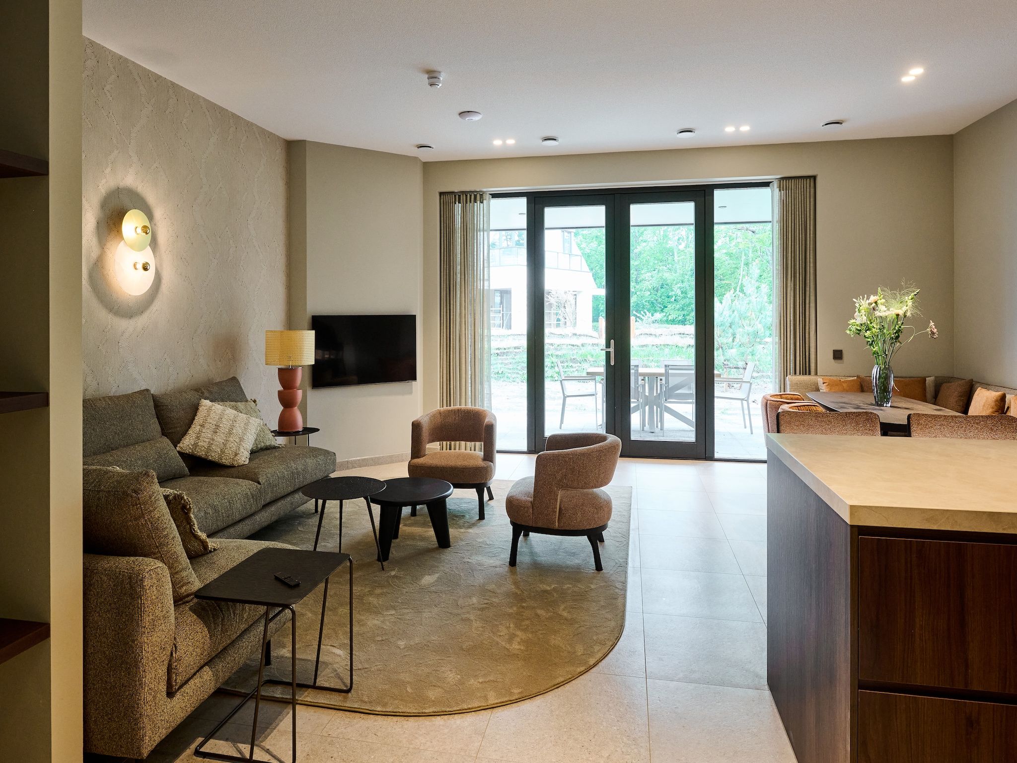 De woonkamer van Droomsuites Texel - 4 persoons appartement in Den Burg