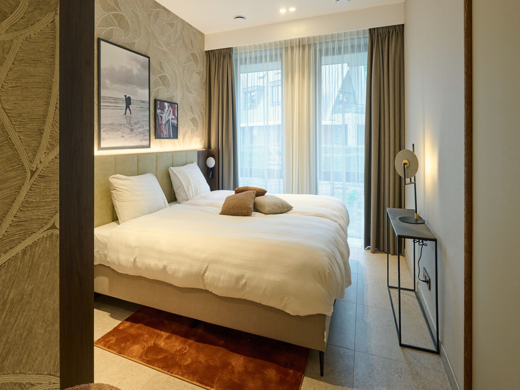 Een slaapkamer van Droomsuites Texel - 4 persoons appartement in Den Burg