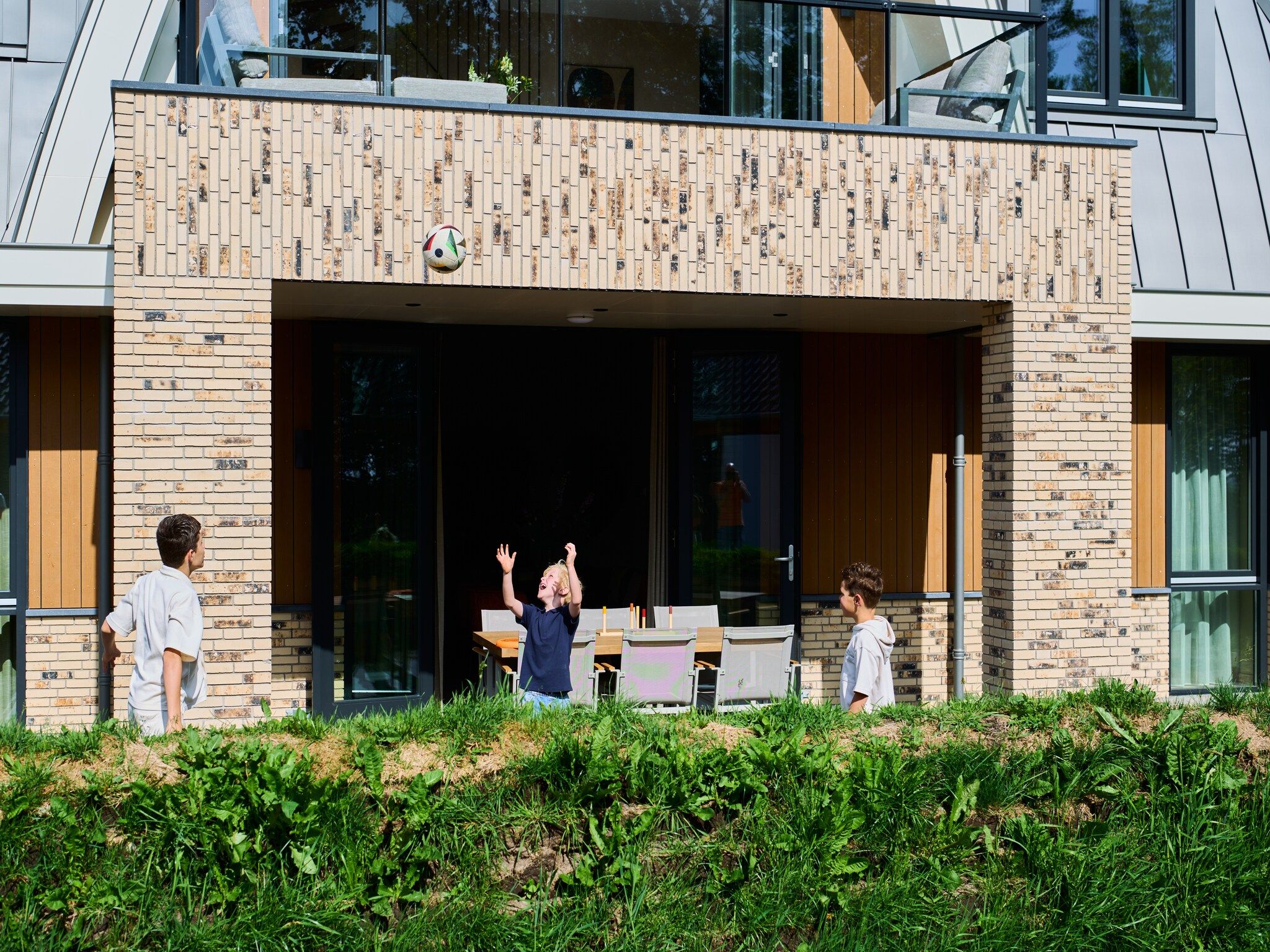 Het terras van Droomsuites Texel - 4 persoons appartement in Den Burg