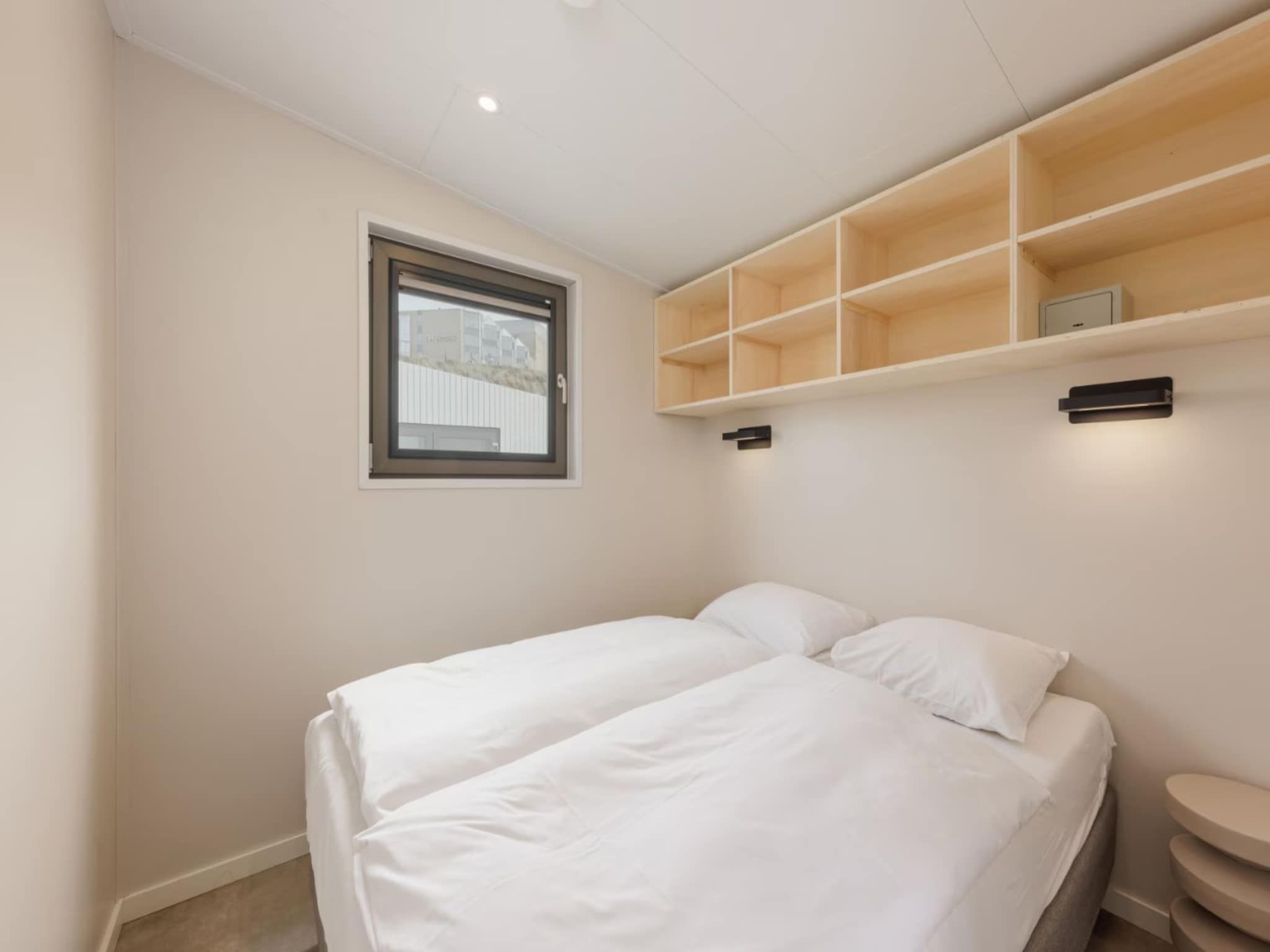 Een slaapkamer van Droomvilla Beach Houses Zandvoort - Partial sea view in Zandvoort