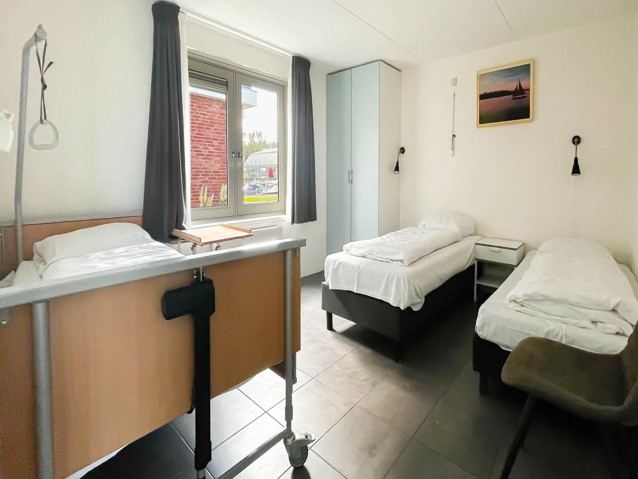 Een slaapkamer van Droomzicht in Uitgeest