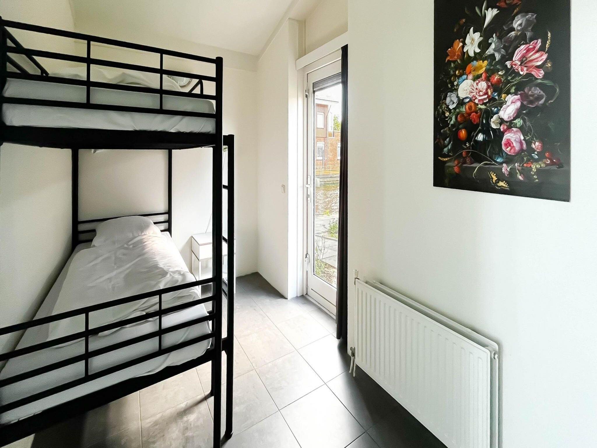 Een slaapkamer van Droomzicht in Uitgeest