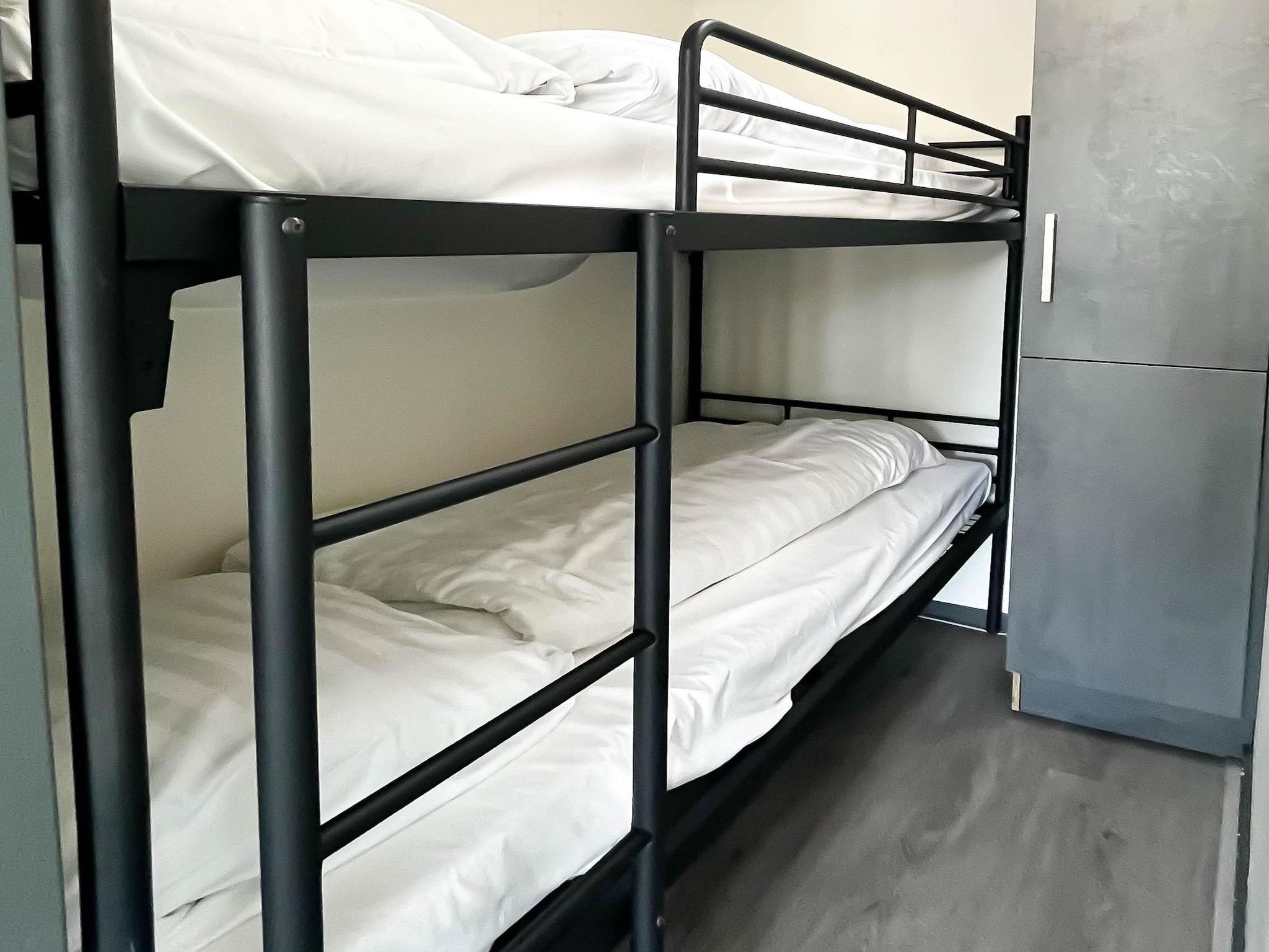 Een slaapkamer van Golfzicht in Uitgeest