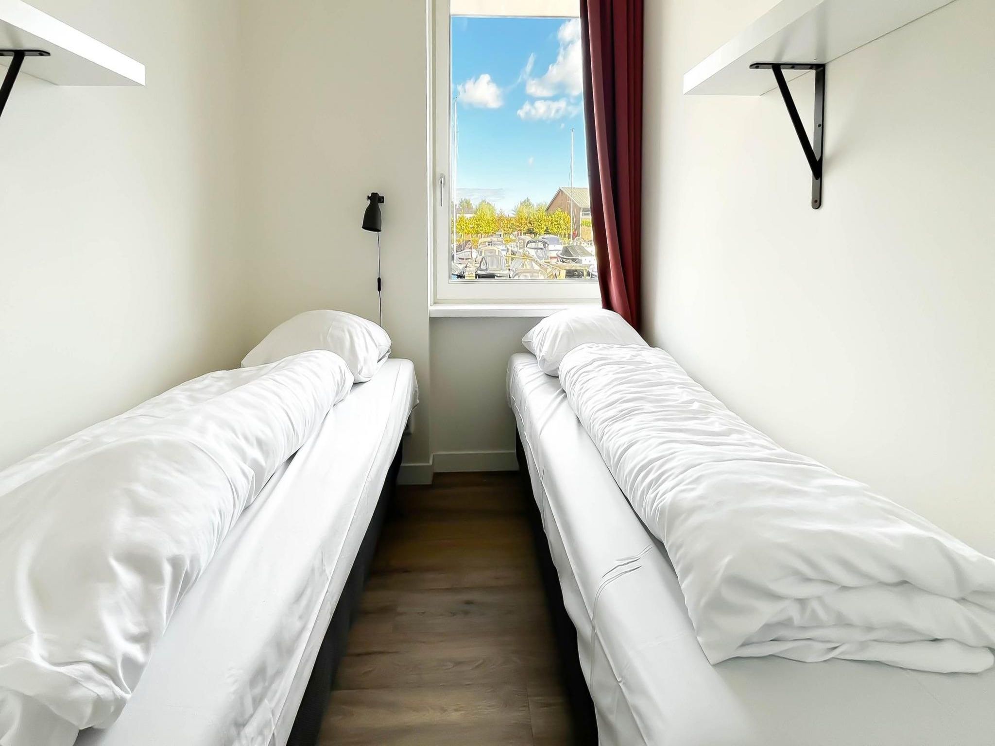 Een slaapkamer van Havenzicht in Uitgeest