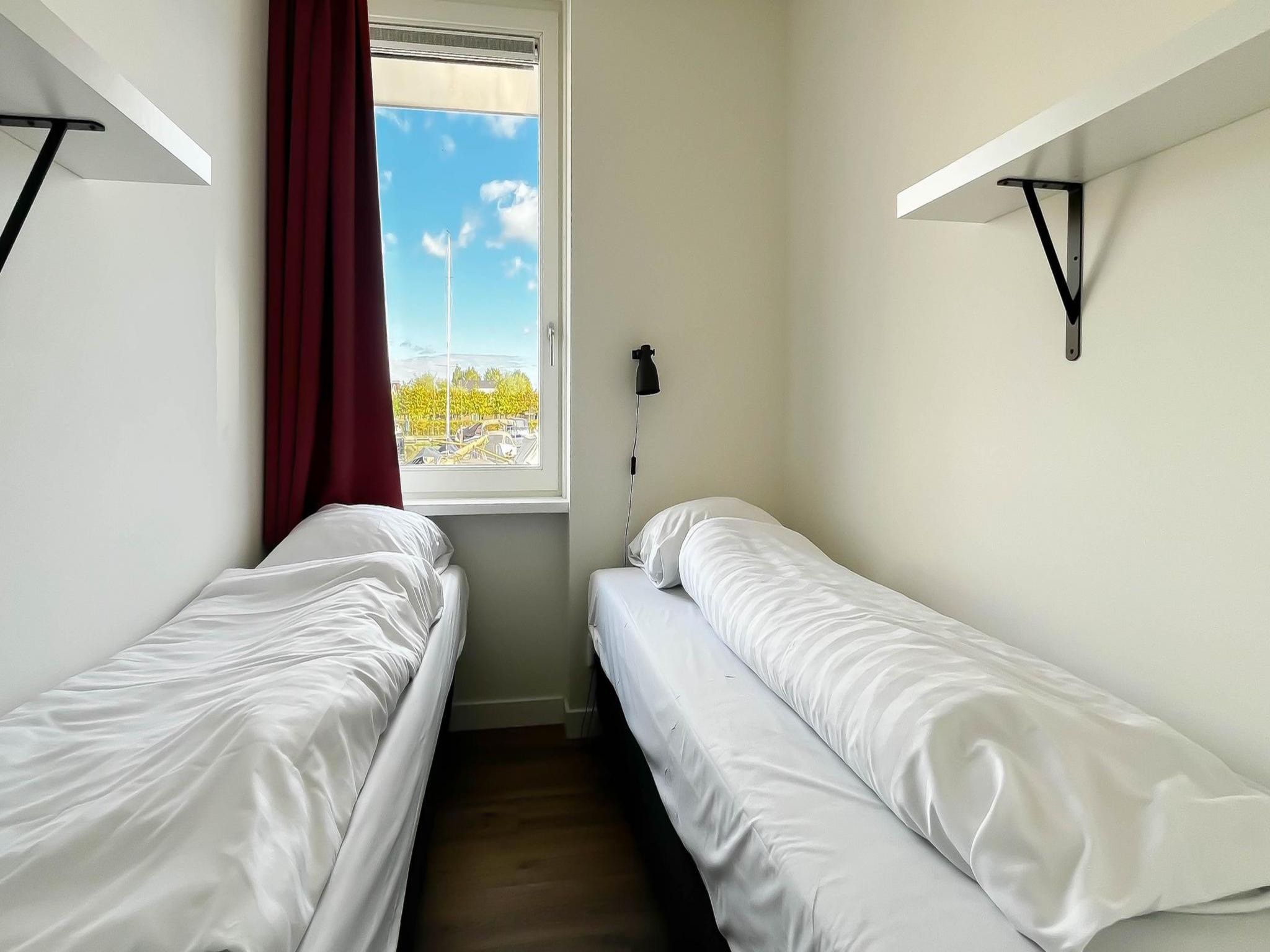 Een slaapkamer van Havenzicht in Uitgeest