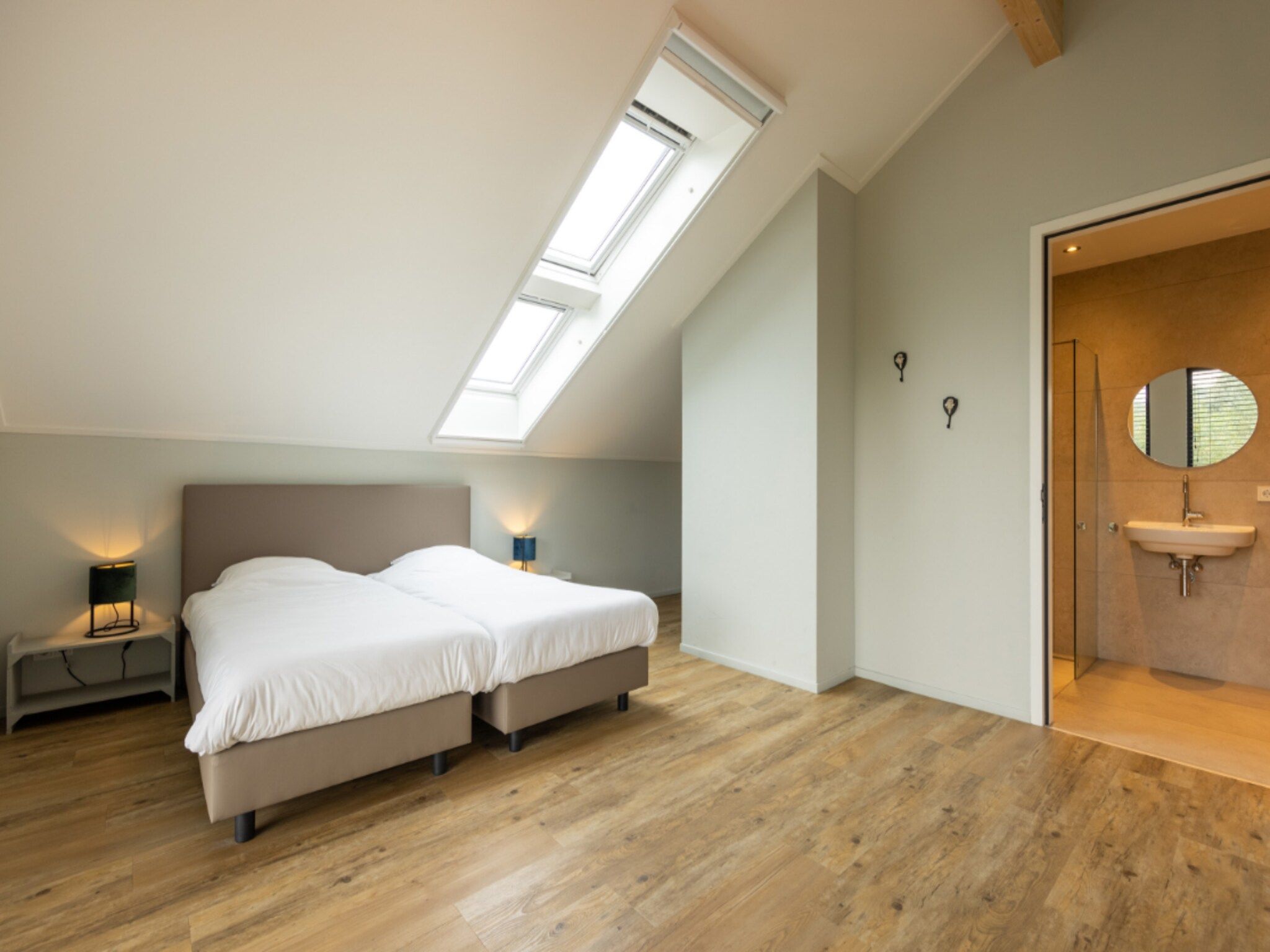 Een slaapkamer van Het Heerlijcke Huis in Aalten