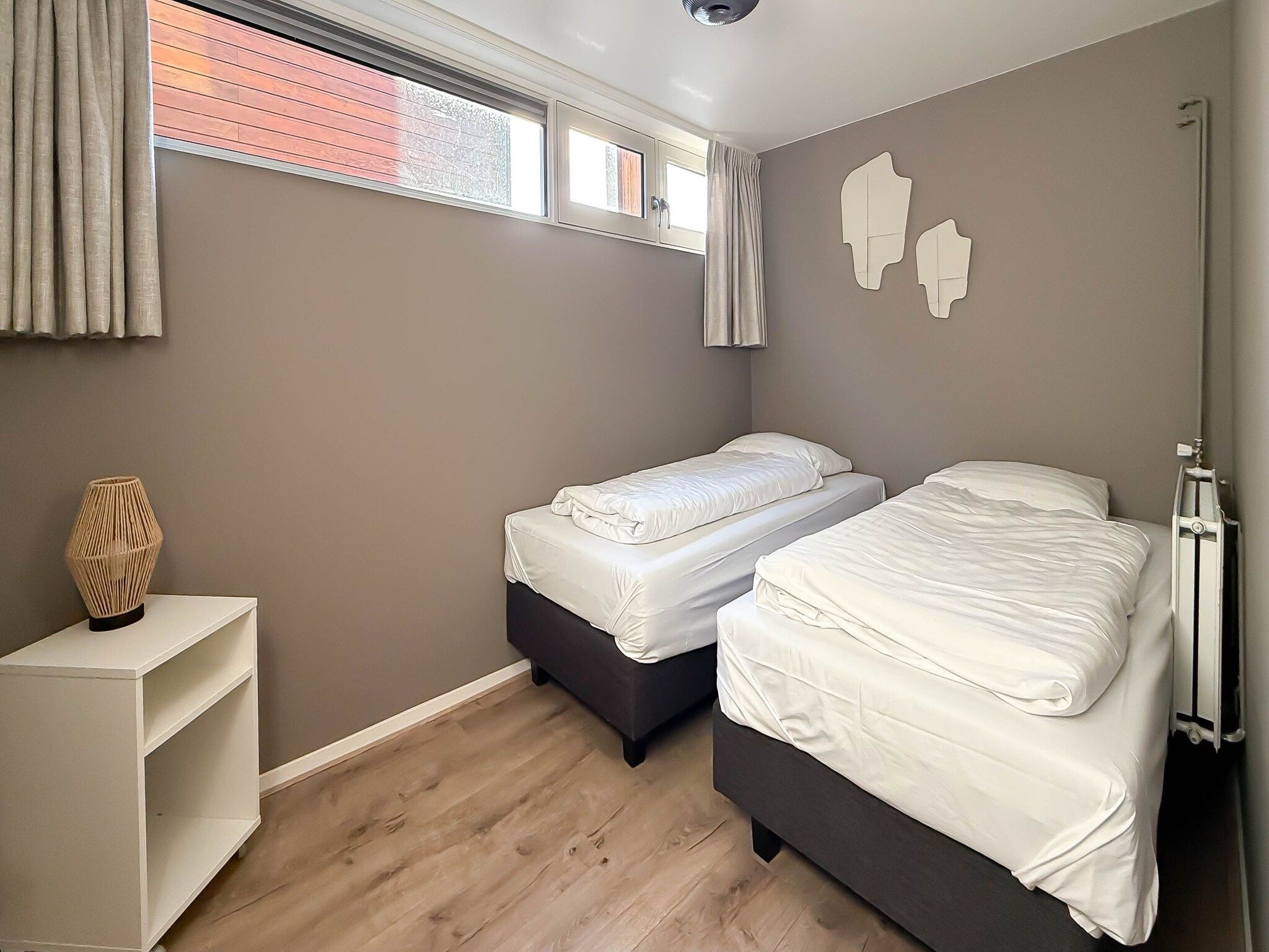 Een slaapkamer van Jachtzicht in Uitgeest