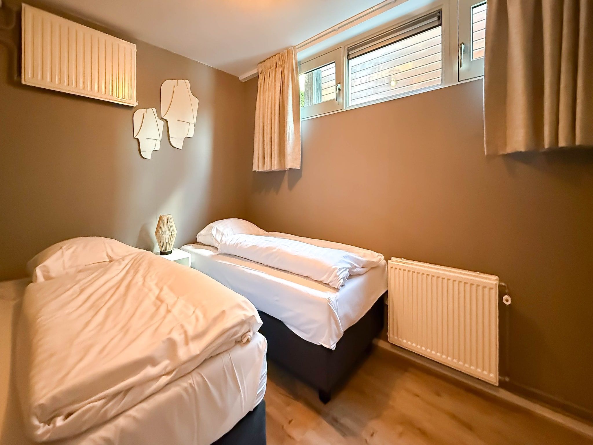 Een slaapkamer van Jachtzicht in Uitgeest
