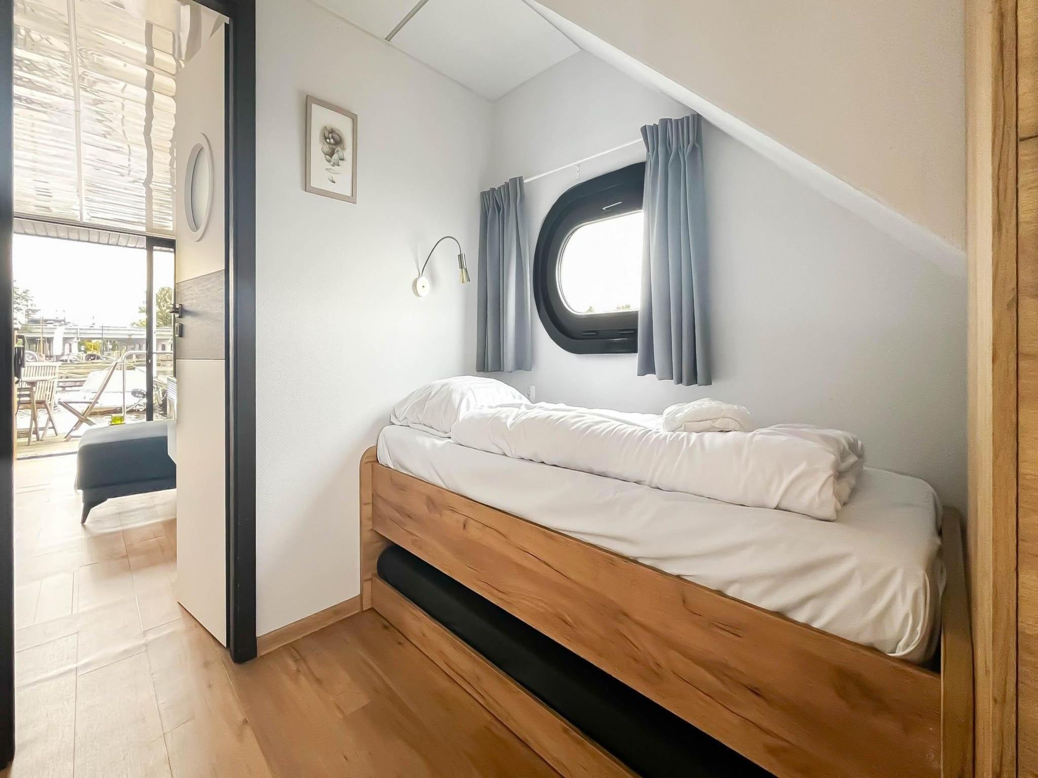 Een slaapkamer van Meerzicht in Uitgeest