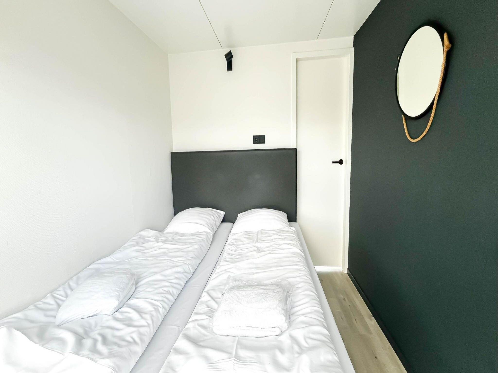 Een slaapkamer van Prachtzicht in Uitgeest