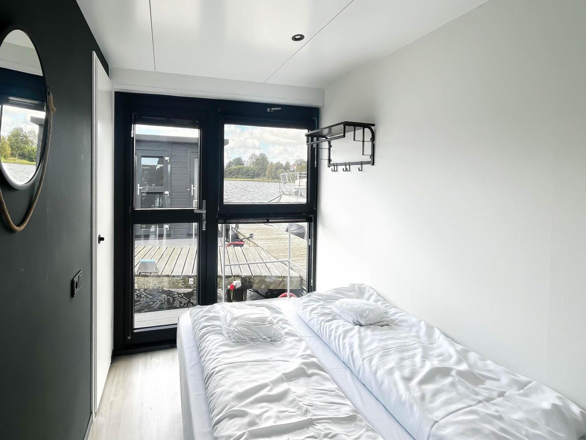 Een slaapkamer van Prachtzicht in Uitgeest