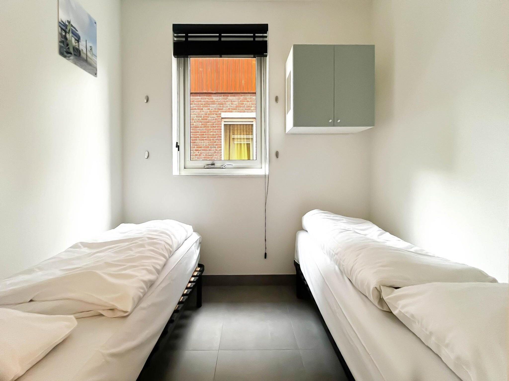 Een slaapkamer van Schelpzicht in Uitgeest