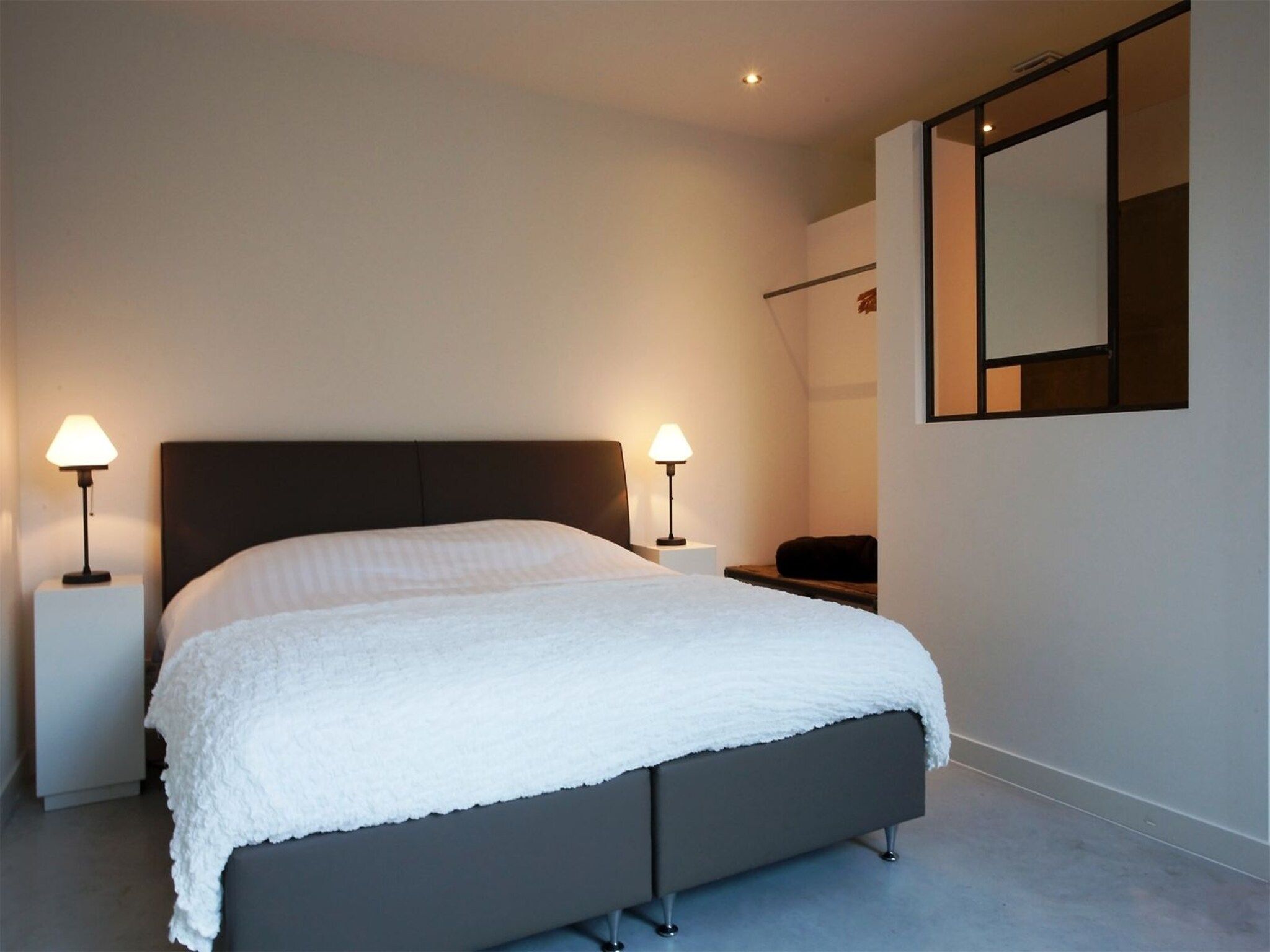 Een slaapkamer van Stalen Boshuis in Oosterhout