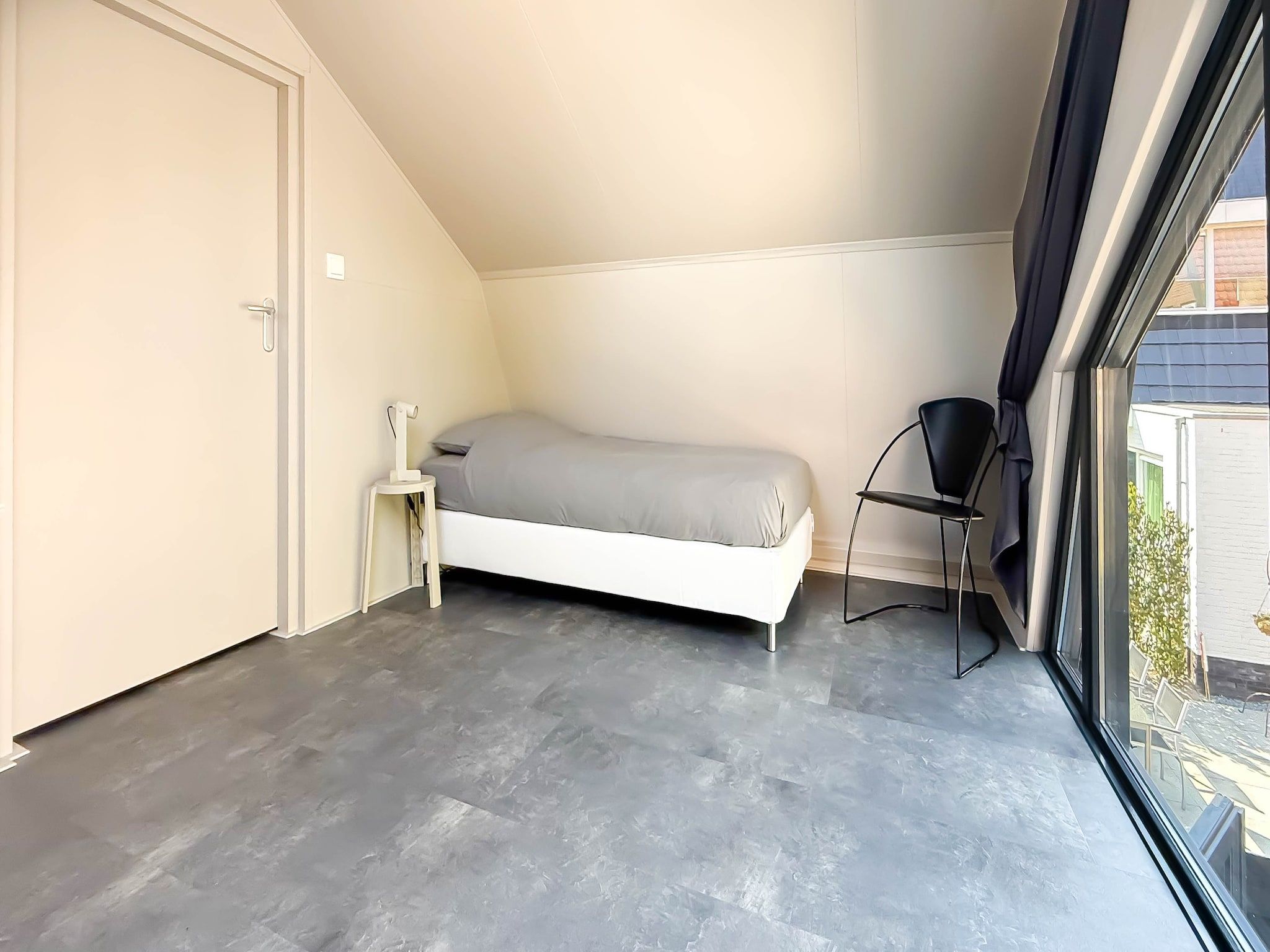 Een slaapkamer van 't Boschhuys in Bergen