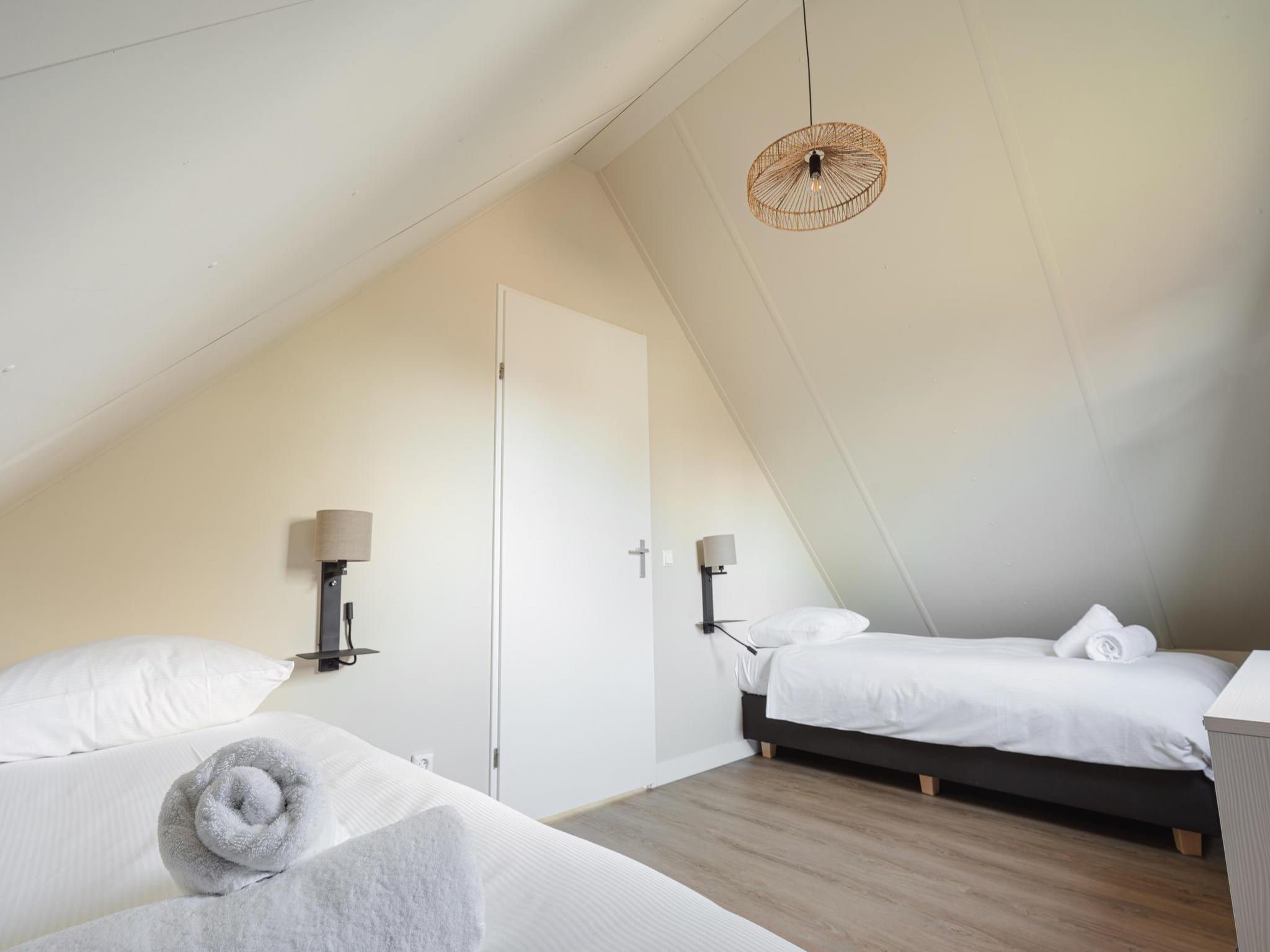 Een slaapkamer van Vakantiehuis Ultiem Genieten - 80 in Sint Maarten