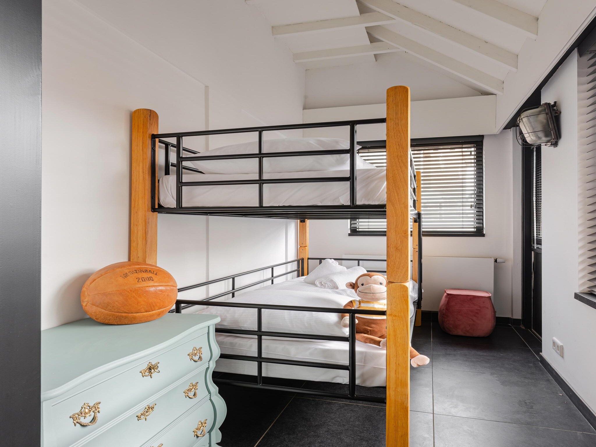 Een slaapkamer van Villa La Chatelaine in Egmond aan Zee