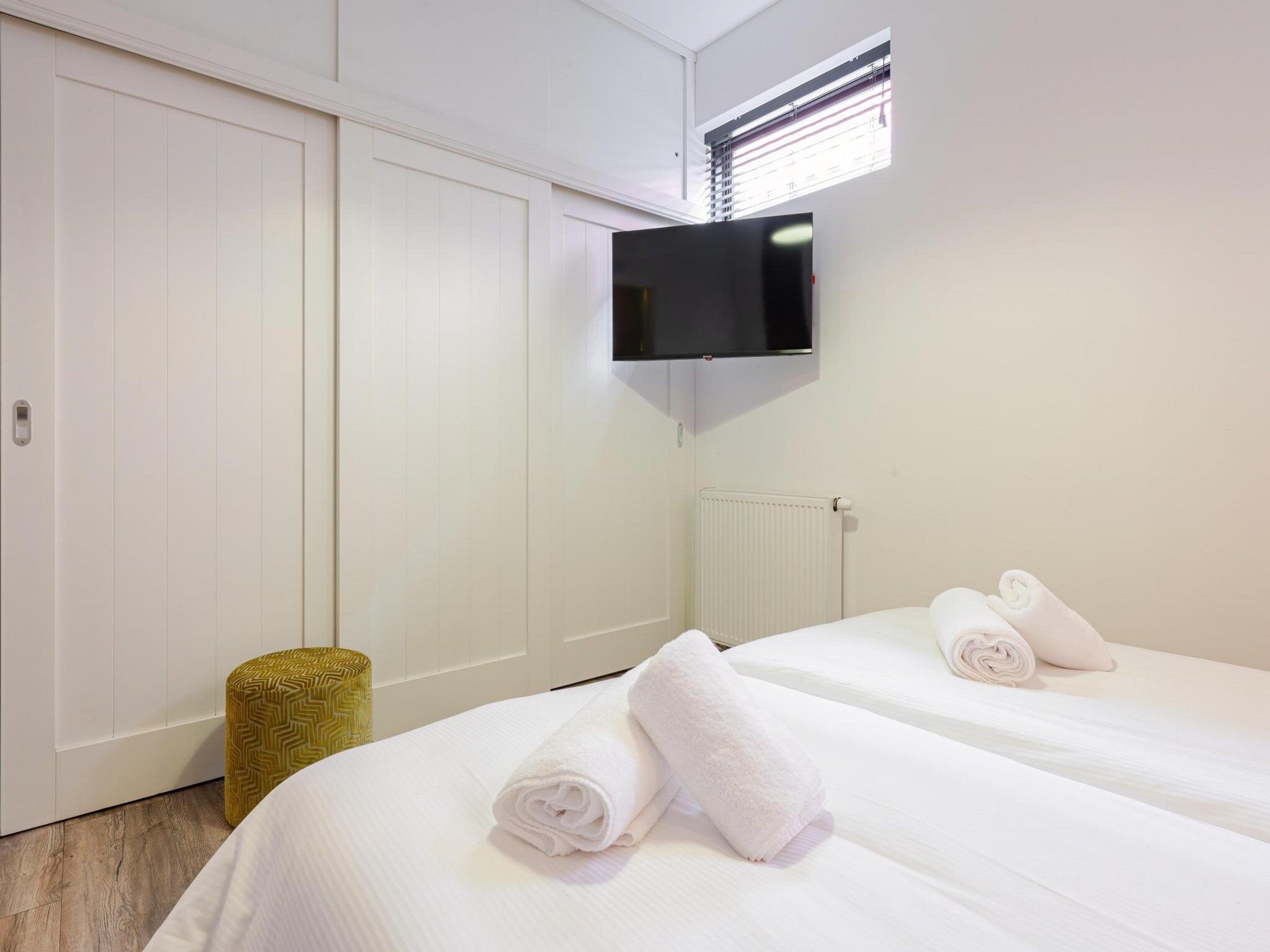 Een slaapkamer van Villa La Chatelaine in Egmond aan Zee