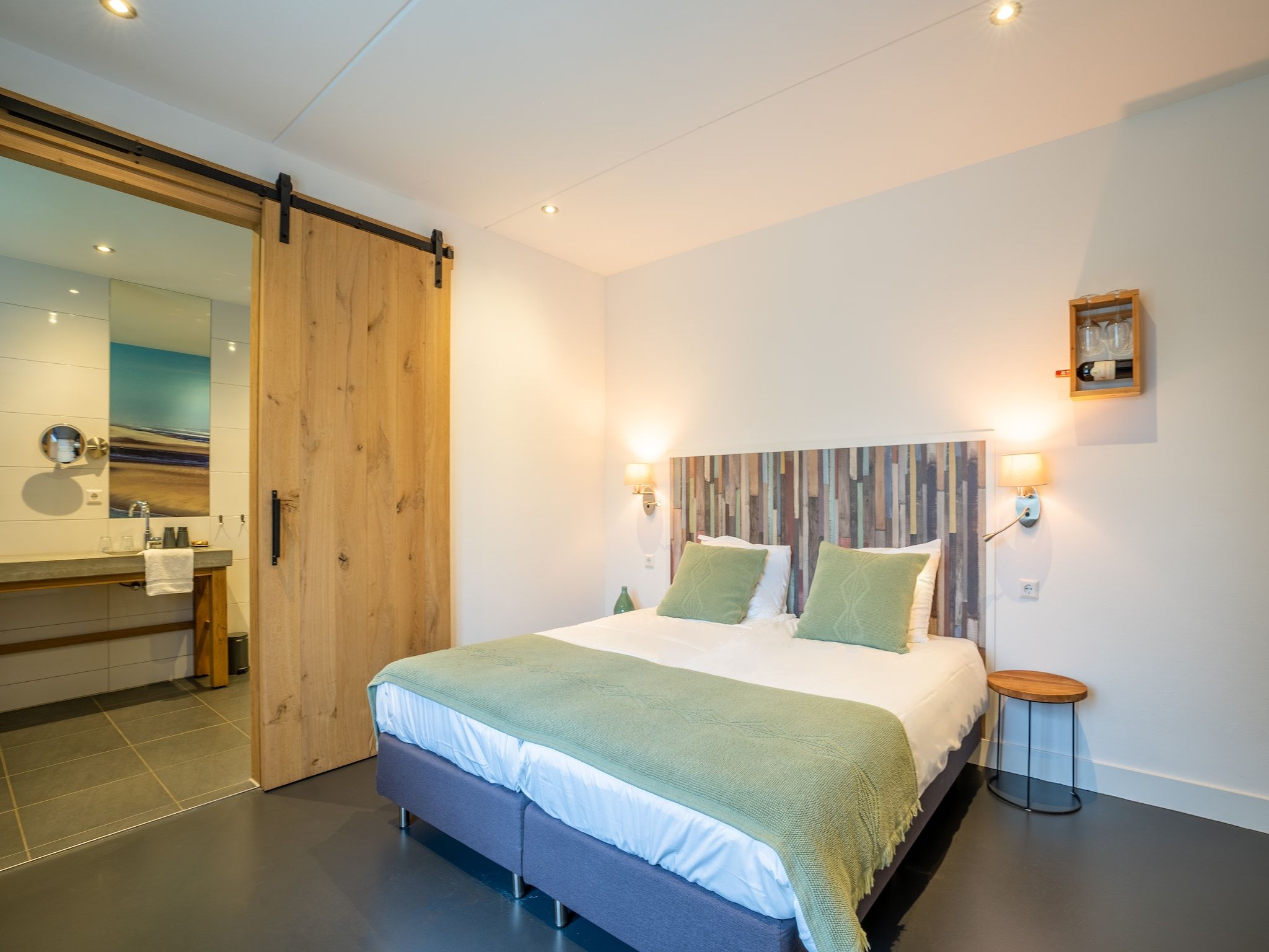 Een slaapkamer van Waddenweelde Texel in Den Burg