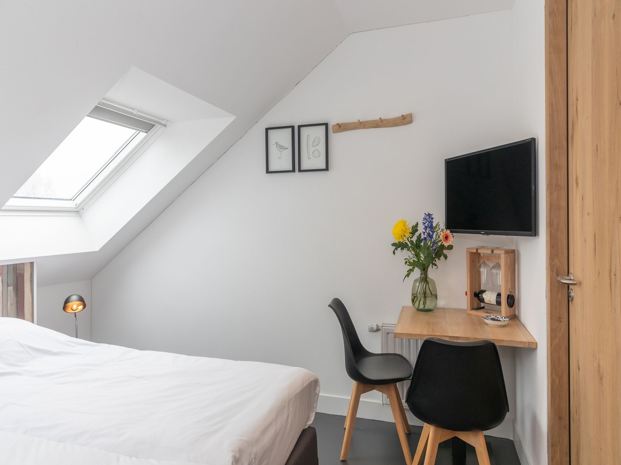 Een slaapkamer van Waddenweelde Texel in Den Burg