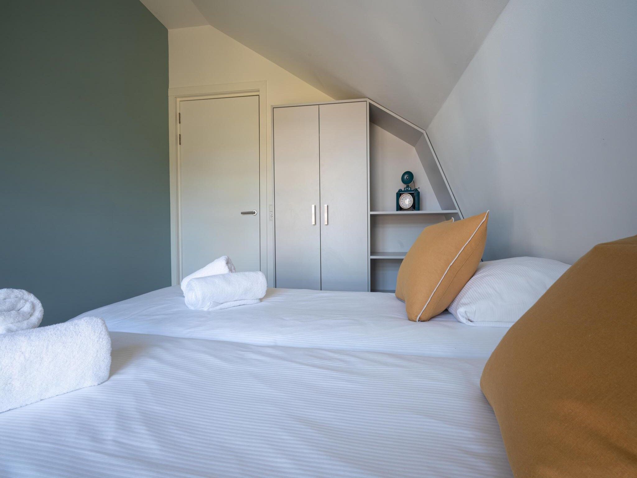 Een slaapkamer van Zicht op de Molen in Egmond aan den Hoef