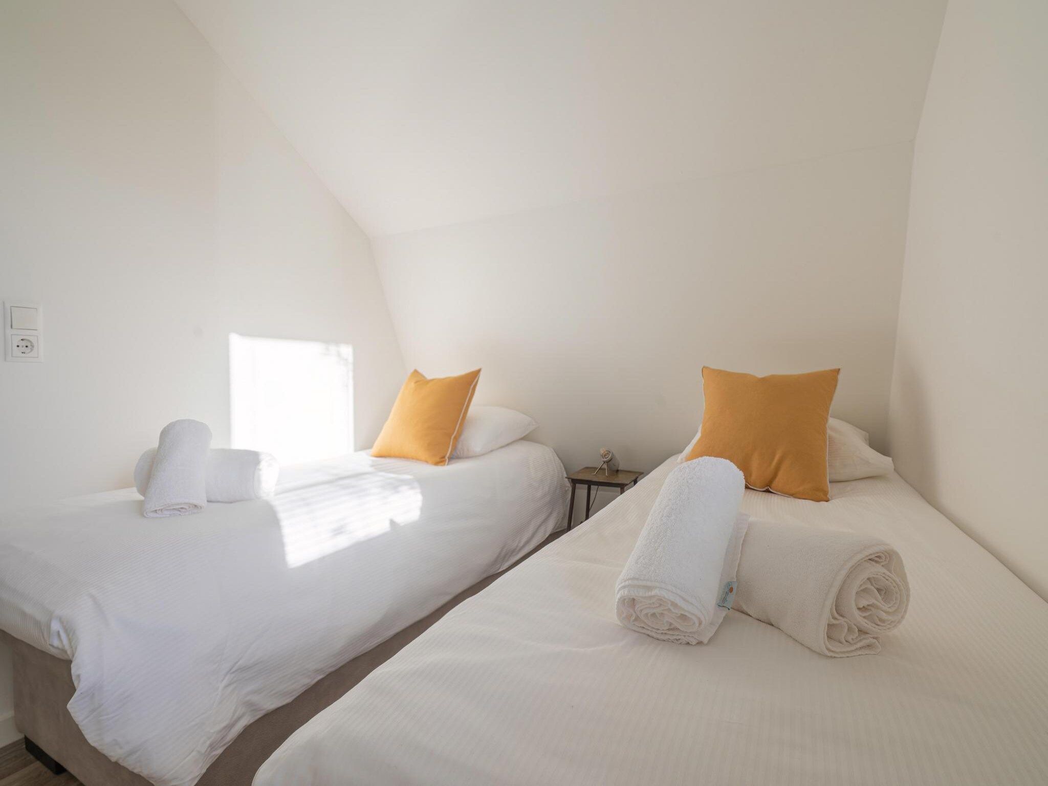 Een slaapkamer van Zicht op de Molen in Egmond aan den Hoef